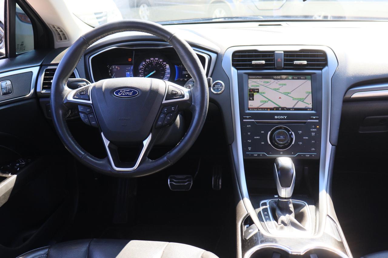 2015 Ford Fusion Titanium | AWD | Leather | Sunroof | Navi | Cam ++ Photo38