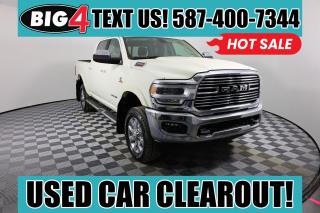 Level up to our Diesel powered 2022 RAM 2500 Laramie Crew Cab 4X4 for a tough truck thats terrifically comfortable in Pearl White! Motivated by a TurboCharged 6.7 Litre Cummins Diesel 6 Cylinder supplying 370hp and 850lb-ft of torque to a 6 Speed Automatic transmission so you can take advantage of our RAMs impressive towing and payload ratings. A heavy-duty suspension makes pulling even easier, and this Four Wheel Drive truck builds on its strength with a bold design. Our 2500 turns heads with an aluminum billet grille, alloy wheels, chrome heated power-folding trailer mirrors, matching bumpers, body-color fender flares, and a damped locking tailgate.

Our Laramie cabin pampers you with heated leather power front seats, a heated leather steering wheel, dual-zone automatic climate control, cruise control, a power sliding rear window, and power-adjustable pedals. Uconnect technology helps you master your mobile communications with an 8.4-inch touchscreen, voice control, WiFi compatibility, Android Auto, Apple CarPlay, and Alpine audio.

Command your days with confidence, knowing RAM provides intelligent safety measures such as a backup camera, parking sensors, ABS, traction control, stability control, hill-start assistance, tire-pressure monitoring, trailer sway control, and advanced airbags. Our 2500 Laramie is a mighty machine for getting more done! Save this Page and Call for Availability. We Know You Will Enjoy Your Test Drive Towards Ownership!