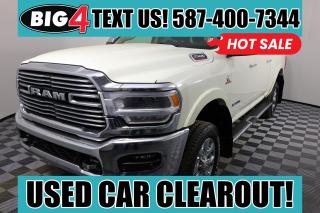 Level up to our Diesel powered 2022 RAM 2500 Laramie Crew Cab 4X4 for a tough truck thats terrifically comfortable in Pearl White! Motivated by a TurboCharged 6.7 Litre Cummins Diesel 6 Cylinder supplying 370hp and 850lb-ft of torque to a 6 Speed Automatic transmission so you can take advantage of our RAMs impressive towing and payload ratings. A heavy-duty suspension makes pulling even easier, and this Four Wheel Drive truck builds on its strength with a bold design. Our 2500 turns heads with an aluminum billet grille, alloy wheels, chrome heated power-folding trailer mirrors, matching bumpers, body-color fender flares, and a damped locking tailgate.

Our Laramie cabin pampers you with heated leather power front seats, a heated leather steering wheel, dual-zone automatic climate control, cruise control, a power sliding rear window, and power-adjustable pedals. Uconnect technology helps you master your mobile communications with an 8.4-inch touchscreen, voice control, WiFi compatibility, Android Auto, Apple CarPlay, and Alpine audio.

Command your days with confidence, knowing RAM provides intelligent safety measures such as a backup camera, parking sensors, ABS, traction control, stability control, hill-start assistance, tire-pressure monitoring, trailer sway control, and advanced airbags. Our 2500 Laramie is a mighty machine for getting more done! Save this Page and Call for Availability. We Know You Will Enjoy Your Test Drive Towards Ownership!