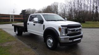 2019 Ford F-550 Flat Deck Crew Cab 4WD, 6.8L V10 SOHC 30V engine, 10 cylinder, 4 door, automatic, 4WD, cruise control, air conditioning, AM/FM radio, power door locks, power windows, power mirrors, white exterior, grey interior, cloth. Certification and decal valid until February 2025. $49,810.00 plus $375 processing fee, $50,185.00 total payment obligation before taxes.  Listing report, warranty, contract commitment cancellation fee, financing available on approved credit (some limitations and exceptions may apply). All above specifications and information is considered to be accurate but is not guaranteed and no opinion or advice is given as to whether this item should be purchased. We do not allow test drives due to theft, fraud and acts of vandalism. Instead we provide the following benefits: Complimentary Warranty (with options to extend), Limited Money Back Satisfaction Guarantee on Fully Completed Contracts, Contract Commitment Cancellation, and an Open-Ended Sell-Back Option. Ask seller for details or call 604-522-REPO(7376) to confirm listing availability.