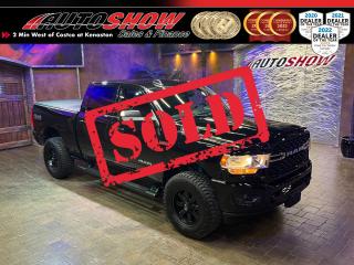 <strong>*** HEAVILY UPGRADED BLACKED OUT SPORT PACKAGE! *** HEATED SEATS & WHEEL, ALPINE PREMIUM STEREO, 12 INCH TOUCHSCREEN!! *** NAVIGATION, TONNEAU, BEDLINER, TOW PACKAGE!! *** </strong>Sharp truck big looks & fantastic history as reported by Carfax!! Fully accessorized... <strong>MORE THAN $12,000.00 IN FACTORY UPGRADES!! </strong>Sleek blacked-out rig equipped with the <strong>OFF-ROAD PACKAGE! </strong>Loaded with features and amazing factory (and aftermarket!) upgrades like <strong>HEATED SEATS</strong>......<strong>HEATED STEERING WHEEL</strong>......<strong>REMOTE START</strong>......<strong>ALPINE PREMIUM STEREO</strong>......<strong>HD SPRAY-IN BEDLINER</strong>......Sport <strong>COLOUR-MATCHED </strong>Bumpers, Grille, Handles......Huge <strong>12 INCH MULTIMEDIA TOUCHSCREEN</strong>......<strong>NAVIGATION </strong>Package......Power Adjustable Seat w/ Lumbar Support......Backup Camera......SiriusXM Satellite Radio......Dual Zone Automatic Climate Control......<strong>BILSTEIN SHOCK ABSORBERS</strong>......Integrated Alexa Assistant......<strong>TONNEAU COVER</strong>......Fog Lights......<strong>RUNNING BOARDS</strong>......<strong>LED </strong>Lights......Power Adjustable Pedals......Automatic Lights......Leather Wheel w/ Media & Cruise Controls......Push Button Ignition......<strong>HILL DESCENT CONTROL</strong>......Powerful <strong>6.4L HEMI V8 </strong>Engine......8-Speed Automatic Transmission......Electronic Shift on the fly <strong>4X4/4WD</strong>......<strong>TOW PACKAGE </strong>w/ 4-Pin & 7-Pin Connectors......Trailer Brake Controller......Tow/Haul Mode......Optional (pictured) <strong>18 INCH </strong><strong>BLACK ALLOY ION WHEELS </strong>w/ <strong>NEW AMP ALL-TERRAIN TIRES </strong>Available!!<br /><br />PLEASE NOTE: AFTERMARKET WHEEL & TIRE PACKAGE (PICTURED) IS AVAILABLE AT AN ADDED COST, ADVERTISED PRICE INCLUDES FACTORY SET.<br /><br />This blacked-out Ram 2500 comes with <strong>FOUR SETS </strong>of Keys & Fobs, Fitted All Weather Mats, and balance of Factory <b>RAM WARRANTY!! </b>Super low kms (18,000). Now sale priced at just $64,800 with Financing & Extended Warranty available!!<br /><br /><br />Will accept trades. Please call (204)560-6287 or View at 3165 McGillivray Blvd. (Conveniently located two minutes West from Costco at corner of Kenaston and McGillivray Blvd.)<br /><br />In addition to this please view our complete inventory of used <a href=\https://www.autoshowwinnipeg.com/used-trucks-winnipeg/\>trucks</a>, used <a href=\https://www.autoshowwinnipeg.com/used-cars-winnipeg/\>SUVs</a>, used <a href=\https://www.autoshowwinnipeg.com/used-cars-winnipeg/\>Vans</a>, used <a href=\https://www.autoshowwinnipeg.com/new-used-rvs-winnipeg/\>RVs</a>, and used <a href=\https://www.autoshowwinnipeg.com/used-cars-winnipeg/\>Cars</a> in Winnipeg on our website: <a href=\https://www.autoshowwinnipeg.com/\>WWW.AUTOSHOWWINNIPEG.COM</a><br /><br />Complete comprehensive warranty is available for this vehicle. Please ask for warranty option details. All advertised prices and payments plus taxes (where applicable).<br /><br />Winnipeg, MB - Manitoba Dealer Permit # 4908     <p>Sold to another happy customer</p>