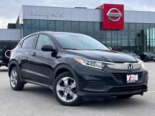 <b>Heated Seats,  Apple CarPlay,  Android Auto,  Collision Mitigation,  Lane Keep Assist!</b><br> <br>    This 2020 HR-V is big on practicality and driveability, with one of the most versatile interiors in its class! This  2020 Honda HR-V is for sale today in Midland. <br> <br>This 2020 Honda HR-V is easily a top contender in the adventure seeking - compact SUV segment. The cabin is extremely flexible and feels very airy, allowing for a sporty and fun ride while having the ability to bring it all with you. With a muscular and sleek styling approach, the HR-V boldly stands out in a crowd and comes prepared for a busy schedule thats full of adventure. Whether youre hitting your favourite biking trail or just hitting the road home, choose your own adventure in this impressive and highly capable 2020 HR-V.This  wagon has 106,367 kms. Its  aegean blue metallic in colour  . It has a cvt transmission and is powered by a  141HP 1.8L 4 Cylinder Engine.  <br> <br> Our HR-Vs trim level is LX. This HR-V LX is loaded with way more than one would expect for a base model trim with heated front seats, automatic climate control, Apple CarPlay, Android Auto, Bluetooth, an audio display, and Siri EyesFree. This SUV also has some great tech to make it feel like a modern car with a driver assistance suite that includes collision mitigation, lane keep assist, adaptive cruise control, and automatic highbeams. Other features include aluminum wheels, heated power side mirrors, multi-angle rearview camera, remote keyless entry, and multi-function steering wheel. This vehicle has been upgraded with the following features: Heated Seats,  Apple Carplay,  Android Auto,  Collision Mitigation,  Lane Keep Assist,  Adaptive Cruise,  Remote Keyless Entry. <br> <br>To apply right now for financing use this link : <a href=https://www.bourgeoisnissan.com/finance/ target=_blank>https://www.bourgeoisnissan.com/finance/</a><br><br> <br/><br>Since Bourgeois Midland Nissan opened its doors, we have been consistently striving to provide the BEST quality new and used vehicles to the Midland area. We have a passion for serving our community, and providing the best automotive services around.Customer service is our number one priority, and this commitment to quality extends to every department. That means that your experience with Bourgeois Midland Nissan will exceed your expectations whether youre meeting with our sales team to buy a new car or truck, or youre bringing your vehicle in for a repair or checkup.Building lasting relationships is what were all about. We want every customer to feel confident with his or her purchase, and to have a stress-free experience. Our friendly team will happily give you a test drive of any of our vehicles, or answer any questions you have with NO sales pressure.We look forward to welcoming you to our dealership located at 760 Prospect Blvd in Midland, and helping you meet all of your auto needs!<br> Come by and check out our fleet of 20+ used cars and trucks and 90+ new cars and trucks for sale in Midland.  o~o