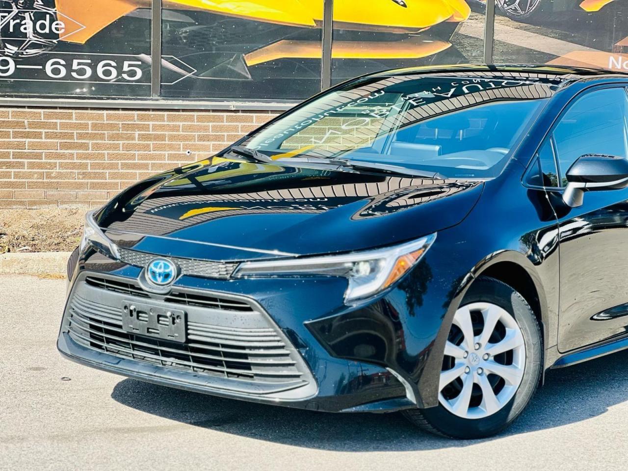 2023 Toyota Corolla Hybrid LE CVT AWD Photo2