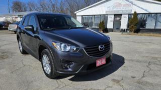 2016 MAZDA CX-5 TOURING with Navigation, Push-button start, Hands-free phone, Voice recognition, Back-up camera, Blind spot monitoring, Rear cross-traffic alert, Tilt and telescopic steering wheel, Cruise control, Leather Interior, Heated Seats, Steering wheel-mounted controls, Power windows, door locks,  mirrors, Air conditioning, AM/FM radio, MP3 playback in-dash CD, 6 total speakers, Bluetooth auxiliary audio input, Bluetooth Wireless data link, Front fog lights, Alarm anti-theft system, Aluminum alloy wheels, Multi-function display and more.<br><br>Purchase price: $16,399 plus HST and LICENSING<br><br>Safety package is available for $799 and includes Ontario Certification, 3 month or 3000 km Lubrico warranty ($1000 per claim) and oil change.<br>If not certified, by OMVIC regulations this vehicle is being sold AS-lS and is not represented as being in road worthy condition, mechanically sound or maintained at any guaranteed level of quality. The vehicle may not be fit for use as a means of transportation and may require substantial repairs at the purchaser   s expense. It may not be possible to register the vehicle to be driven in its current condition.<br><br>CARFAX PROVIDED FOR EVERY VEHICLE<br><br>WARRANTY: Extended warranty with different terms and coverages is available, please ask our representative for more details.<br>FINANCING: Bad Credit? Good Credit? No Credit? We work with you to find the best financing plan that fits your budget. Our specialists are happy to assist you with all necessary information.<br>TRADE-IN OR SELL: Upgrade your ride by trading-in your vehicle and save on taxes, or Sell it to us, and get the best value for your current vehicle.<br><br>Smart Wheels Used Car Dealership<br>642 Dunlop St West, Barrie, ON L4N 9M5<br>Phone: (705)721-1341<br>Email: Info@swcarsales.ca<br>Web: www.swcarsales.ca<br><br>Terms and conditions may apply. Price and availability subject to change. Contact us for the latest information.