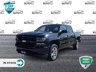 Black 2018 Chevrolet Silverado 1500 Custom 4D Crew Cab EcoTec3 5.3L V8 6-Speed Automatic Electronic with Overdrive 4WD | Apple Carplay | Android Auto, 6-Speed Automatic Electronic with Overdrive, 4WD, Dark Ash With Jet Black Interior Accents Cloth, 150 Amp Alternator, 20 x 9 Chrome Clad Aluminum Wheels, 4-Wheel Disc Brakes, 6 Speakers, ABS brakes, Air Conditioning, Alloy wheels, AM/FM radio, Bluetooth® For Phone, Body Colour Rear Bumper w/Cornersteps, Body-Colour Grille Surround, Body-Colour Headlamp Bezels, Body-Colour Pwr Adjustable Heated Outside Mirrors, Brake assist, Chevrolet Connected Access, Chevrolet w/4G LTE, Colour-Keyed Carpeting w/Rubberized Vinyl Floor Mats, Custom Convenience Package, Deep-Tinted Glass, Delay-off headlights, Driver Information Centre, Dual front impact airbags, Dual front side impact airbags, Electric Rear-Window Defogger, Electronic Stability Control, Exterior Parking Camera Rear, Front anti-roll bar, Front Body-Colour Bumper, Front Frame-Mounted Black Recovery Hooks, Front wheel independent suspension, Fully automatic headlights, Graphite-Coloured Rubberized-Vinyl Floor Covering, Heavy Duty Suspension, Heavy-Duty Rear Locking Differential, High-Intensity Discharge Headlights, Low tire pressure warning, Manual Tilt Wheel Steering Column, Occupant sensing airbag, OnStar & Chevrolet Connected Services Capable, Overhead airbag, Power steering, Power windows, Power Windows w/Driver Express Up, Preferred Equipment Group 1CX, Premium audio system: Chevrolet MyLink, Radio data system, Radio: AM/FM w/7 Diagonal Colour Touch Screen, Rear 60/40 Folding Bench Seat (Folds Up), Remote Keyless Entry, Remote Locking Tailgate, Silverado Custom Trim, SiriusXM, Speed control, Speed-sensing steering, Traction control, Trailering Package.
1<p> </p>

<h4>VALUE+ CERTIFIED PRE-OWNED VEHICLE</h4>

<p>36-point Provincial Safety Inspection<br />
172-point inspection combined mechanical, aesthetic, functional inspection including a vehicle report card<br />
Warranty: 30 Days or 1500 KMS on mechanical safety-related items and extended plans are available<br />
Complimentary CARFAX Vehicle History Report<br />
2X Provincial safety standard for tire tread depth<br />
2X Provincial safety standard for brake pad thickness<br />
7 Day Money Back Guarantee*<br />
Market Value Report provided<br />
Complimentary 3 months SIRIUS XM satellite radio subscription on equipped vehicles<br />
Complimentary wash and vacuum<br />
Vehicle scanned for open recall notifications from manufacturer</p>

<p>SPECIAL NOTE: This vehicle is reserved for AutoIQs retail customers only. Please, No dealer calls. Errors & omissions excepted.</p>

<p>*As-traded, specialty or high-performance vehicles are excluded from the 7-Day Money Back Guarantee Program (including, but not limited to Ford Shelby, Ford mustang GT, Ford Raptor, Chevrolet Corvette, Camaro 2SS, Camaro ZL1, V-Series Cadillac, Dodge/Jeep SRT, Hyundai N Line, all electric models)</p>

<p>INSGMT</p>