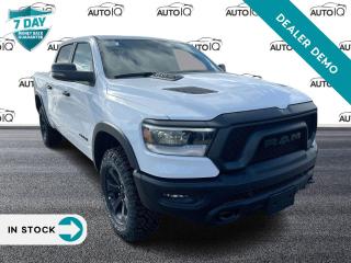 <p><strong>Unleash the Power and Style: Introducing the 2024 RAM 1500 Rebel Night Crew Cab 4X4</strong></p>

<p><strong>Unrivaled Performance:</strong> Get ready to conquer the road with the 2024 RAM 1500 Rebel Night Crew Cab 4X4. Equipped with a formidable 5.7L HEMI VVT V8 engine paired with an 8-speed automatic transmission, this truck delivers exhilarating performance and unmatched power. With features like the Sport performance hood and E-Locker rear axle, every drive becomes an adventure.</p>

<p><strong>Bold Exterior, Luxurious Interior:</strong> Stand out from the crowd with the striking Bright White exterior paired with a sleek Black interior featuring leather-faced/vinyl bucket seats. The Night Edition package adds a touch of sophistication with its exclusive design elements, while the Dual-Pane Panoramic Sunroof lets you experience the thrill of open-air driving like never before.</p>

<p><strong>Advanced Safety and Convenience:</strong> Experience peace of mind on every journey with the Advanced Safety Group, including features like Pedestrian Emergency Braking, Lane Keep Assist, and Adaptive Cruise Control with Stop & Go. The Comfort & Convenience Group adds second-row heated seats, a wireless charging pad, and power-adjustable seats for ultimate comfort and convenience.</p>

<p><strong>Unmatched Technology:</strong> Stay connected and entertained with the Uconnect 5W NAV system featuring a 12-inch touchscreen display and a 19-speaker Harman/Kardon premium sound system. The Rebel Level 2 Equipment Group enhances your driving experience with accent color door handles, remote start system, and Park-Sense Front and Rear Park Assist with stop.</p>

<p><strong>Capability Redefined:</strong> With the Electronic shift-on-demand transfer case, Trailer Brake Control, and Class IV hitch receiver, the RAM 1500 Rebel Night is ready to tackle any task with ease. Whether you're towing heavy loads or exploring off the beaten path, this truck offers unmatched capability and versatility.</p>

<p><strong>Experience the Ultimate Driving Experience:</strong> Don't settle for ordinary. Elevate your driving experience with the 2024 RAM 1500 Rebel Night Crew Cab 4X4. Visit our dealership today and discover the perfect blend of power, style, and luxury firsthand. It's time to unleash your adventurous spirit on the road.</p>
<p> </p>

<p><em>Note: This is a used demo vehicle. The price may include added aftermarket accessories. Please contact dealer for details and current mileage.</em></p>

<h4>BUY WITH COMPLETE CONFIDENCE</h4>

<p>AutoIQ Exclusive Pre-Owned Program<br />
Shop online or in-store, any way you want it<br />
Virtual trade estimate & appraisal<br />
Virtual credit approval & eSignature<br />
7-Day Money Back Guarantee*</p>

<p>The AutoIQ Dealership Group came together in 2016 with a mission to deliver an exceptional car-buying experience. With 16 dealerships across Ontario, offering 14 brands and over 2500 vehicles in stock, AutoIQ customers can expect great selection, value, and trust. Buying a new vehicle is a significant purchase, and we want to ensure that you LOVE it! Whether you are purchasing a new or quality pre-owned vehicle from us, we offer attractive financing rates and flexible terms, regardless of your credit.</p>

<p>SPECIAL NOTE: This vehicle is reserved for AutoIQs retail customers only. Please, no dealer calls. Errors and omissions excepted.</p>

<p>*As-traded, specialty or high-performance vehicles are excluded from the 7-Day Money Back Guarantee Program (including, but not limited to Ford Shelby, Ford mustang GT, Ford Raptor, Chevrolet Corvette, Camaro 2SS, Camaro ZL1, V-Series Cadillac, Dodge/Jeep SRT, Hyundai N Line, all electric models)</p>

<p>INSGMT</p>