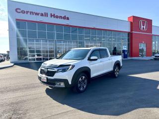 White Diamond Pearl 2017 Honda Ridgeline Touring AWD 6-Speed Automatic 3.5L V6 SOHC i-VTEC 24V. This Ridgeline is ready to take on anything; being the Touring trim, this Ridgeline is equipped with all the features you could need. This Ridgeline comes to us well maintained and in great condition! Every pre-owned vehicle Cornwall Honda gets must go through a rigorous 100-point safety inspection performed by our Honda-trained technicians. 



At Cornwall Honda, we wouldnt let you leave our lot in a dirty vehicle, thats why our experienced, on-hand detailers are ready to take care of each vehicle sold. This is to ensure that your pre-owned vehicle looks as best as it possibly can. From steam cleaning all materials and fabrics to polishing any type of surface, we do it all!



Visit us at our dealership located at 2660 Brookdale Ave., Cornwall, ON.



Welcome to Cornwall Honda where we have been proudly serving the Cornwall and surrounding area since the early 1970s. Our team is committed to making this your best car-buying experience. One-stop shopping is a reality at Cornwall Honda. We have the vehicle that meets your needs. Located in beautiful Cornwall, just south of highway 401.



Cornwall Honda offers preferred bank rates and finance options for all walks-of-life in a professional, informative, and comfortable atmosphere. Our Finance team will work for you to get you approved for the vehicle you want.



CALL TODAY TO BOOK YOUR TEST DRIVE!!!!!



Black Leather.



Full Vehicle History Report includes CarFax Report and any available Maintenance/Repair Records.



Awards:

  * JD Power Canada Automotive Performance, Execution and Layout