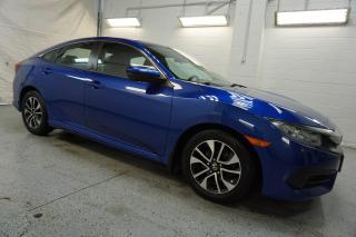 <div>*LOCAL ONATRIO CAR*CERTIFIED<span>*</span><span> </span><span>Very Clean Honda Civic LX 2.0L 4Cyl with Automatic Transmission has, Heated Seats, Bluetooth and Cruise Control. Blue on Charcoal Interior. Fully Loaded with: Power Door Locks, Power Windows, and Power Heated Mirrors, CD/AUX, AC, keyless, Cruise Control, Back Up Camera, Bluetooth, Steering Mounted Controls, Heated Front Seats, Fog Lights, And All The Power Options !!!!! </span></div><br /><div><span>Vehicle Comes With: Safety Certification, our vehicles qualify up to 4 years extended warranty, please speak to your sales representative for more details.</span></div><br /><div><span>Auto Moto Of Ontario @ 583 Main St E. , Milton, L9T3J2 ON. Please call for further details. Nine O Five-281-2255 ALL TRADE INS ARE WELCOMED!<o:p></o:p></span></div><br /><div><span>We are open Monday to Saturdays from 10am to 6pm, Sundays closed.<o:p></o:p></span></div><br /><div><span> <o:p></o:p></span></div><br /><div><a name=_Hlk529556975><span>Find our inventory at  </span></a><a href=http://www/ target=_blank>www</a><a href=http://www.automotoinc/ target=_blank> automotoinc</a><a href=http://www.automotoinc.ca/><span> ca</span></a></div>