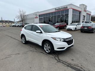 HR-V LX WITH HEATED SEATS, CLIMATE CONTROL, AND BACKUP CAMERA!

The 2016 Honda HR-V LX is equipped with a 1.8L 4-cylinder engine, delivering a balance of power and efficiency suitable for daily driving. This engine is paired with an automatic transmission, providing smooth acceleration and responsive performance on various road conditions. The HR-Vs agile handling and well-tuned suspension contribute to a comfortable ride quality, making it suitable for city commuting and highway cruising alike. Additionally, its fuel-efficient nature helps keep running costs low while minimizing environmental impact.

Moving to the features, the Honda HR-V LX comes generously equipped with a variety of amenities aimed at enhancing convenience, safety, and entertainment. Standard features may include a multi-angle rearview camera for improved visibility while reversing, Bluetooth connectivity for hands-free calling and audio streaming, a 5-inch infotainment display screen, and a USB audio interface for seamless smartphone integration. Other features like cruise control, air conditioning, and power accessories further enhance the overall driving experience, ensuring occupants comfort and convenience.

Inside the cabin, the Honda HR-V LX offers a spacious and versatile environment designed to accommodate passengers and cargo with ease. Despite its compact footprint, the HR-V provides ample legroom and headroom for both front and rear passengers, ensuring a comfortable ride for all occupants. The rear Magic Seat® allows for various cargo and seating configurations, enabling users to maximize cargo space as needed. Additionally, high-quality materials and thoughtful design elements contribute to a refined and upscale interior ambiance.

In conclusion, the 2016 Honda HR-V LX combines reliable performance, a comprehensive set of features, and a spacious interior to offer a well-rounded driving experience. With its efficient engine, versatile features, and comfortable cabin, the HR-V LX is a practical choice for individuals or small families seeking a versatile and fuel-efficient crossover SUV. Whether navigating city streets or embarking on weekend getaways, the HR-V LX delivers on both practicality and enjoyment.