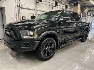 ONLY 9,400 KMS!! STUNNING DIAMOND BLACK CRYSTAL PEARL WARLOCK 4x4 CREW CAB W/ OVER $5,500 OF FACTORY OPTIONS! Premium 5.7L Hemi, backup camera w/ rear park sensors, Mopar black running boards, premium 20-inch black alloys, 8.4-inch touchscreen w/ Apple CarPlay/Android Auto, tow package w/ integrated trailer brake controller, Mopar Sport Performance hood, skid plates, dual-zone climate control, upgraded 121-litre fuel tank, premium power sliding rear window, black dual-exhaust tips, cargo lamp, automatic headlights, LED fog lights, 5-foot 7-inch box, Bluetooth and more! This vehicle just landed and is awaiting a full detail and photo shoot. Contact us and book your road test today!
