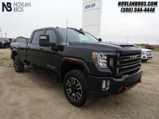 <b>Navigation, Heated Seats, Alloy Wheels, Leather Interior, Rear View Camera!</b><br> <br> Check out our great inventory of pre-owned vehicles at Novlan Brothers!<br> <br>   Who said work had to be uncomfortable? Break from the normal in this uber capable GMC Sierra HD. This  2020 GMC Sierra 3500HD is fresh on our lot in Paradise Hill. <br> <br>The GMC Sierra HD is here to change trucks forever. With useful features designed to make your work day easier, along with professional grade comforts, youll never want to go back. Experience professional grade capability and next level comfort over rough terrain with its expertly designed seats and pro grade suspension. The GMC Sierra 3500HD is strong enough to get the job done no matter the conditions, while remaining comfortable and stylish enough to be the family adventure vehicle. This  sought after diesel Crew Cab 4X4 pickup  has 180,181 kms. Its  black in colour  . It has a 6 speed automatic transmission and is powered by a  445HP 6.6L 8 Cylinder Engine.  <br> <br> Our Sierra 3500HDs trim level is AT4. Get ready to shred with this Sierra HD AT4, complete with an off-road suspension package, skid plates, hill descent control, red recovery hooks, a spray on bedliner and a blacked-out front grille. This sweet truck also comes with leather heated and cooled seats, power adjustable pedals with memory settings, a heavy-duty locking rear differential, signature LED lighting, a larger 8 inch touchscreen premium infotainment system with Apple CarPlay, Android Auto and 4G LTE capability, an EZ-Lift and Lower MultiPro tailgate, stylish aluminum wheels, remote keyless entry and a remote engine start, a CornerStep rear bumper and cargo tie downs hooks with LED box lighting. Additionally, this truck also comes with a useful rear vision camera with hitch guidance, a leather wrapped heated steering wheel with audio controls, rear heated seats, and a ProGrade trailering system with an integrated brake controller. This vehicle has been upgraded with the following features: Navigation, Heated Seats, Alloy Wheels, Leather Interior, Rear View Camera, Remote Engine Start, Reverse Sense System. <br> <br>To apply right now for financing use this link : <a href=http://novlanbros.com/credit/ target=_blank>http://novlanbros.com/credit/</a><br><br> <br/><br>The Novlan family is owned and operated by a third generation and committed to the values inherent from our humble beginnings.<br> Come by and check out our fleet of 30+ used cars and trucks and 50+ new cars and trucks for sale in Paradise Hill.  o~o