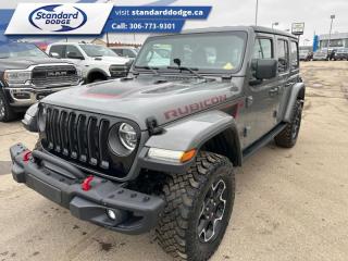 <b>Leather Seats, Heated Seats, Black 3-Piece Hard Top, Premium Audio, Trailer Tow!</b><br> <br>  Compare at $49288 - Our Price is just $45995! <br> <br>   A family SUV with trail rated components, this Wrangler Unlimited is ready for wherever life takes you. This  2020 Jeep Wrangler Unlimited is for sale today in Swift Current. <br> <br>No matter where your next adventure takes you, this Jeep Wrangler Unlimited is ready for the challenge. With advanced traction and handling capability, sophisticated safety features and ample ground clearance, the Wrangler is designed to climb up and crawl over the toughest terrain. Inside the cabin of this Wrangler Unlimited offers supportive seats and comes loaded with the technology you expect while staying loyal to the style and design youve come to know and love.This  SUV has 107,924 kms. Its  sting-gray clear coat in colour  . It has an automatic transmission and is powered by a  285HP 3.6L V6 Cylinder Engine.  <br> <br> Our Wrangler Unlimiteds trim level is Rubicon. This Wrangler Rubicon Unlimited gets a performance off-road suspension with exclusive aluminum wheels, a special Rubicon hood decal plus extra skid plates and red tow hooks. Front and Rear Dana axles, a Rock-Trac two speed transfer case, shift on the fly 4x4 system, fog lights and automatic headlamps to take on any trail. For the drive to the trail head you get heated power side mirrors, a 7 inch customizable instrument display, rear view camera, illuminated cup holders, leather steering wheel with audio and cruise control, remote keyless entry, power windows, 115 volt power outlet, and automatic climate control for comfort, plus Uconnect 4 with 7 inch touchscreen, Apple CarPlay, Android Auto, SiriusXM, Bluetooth, 4 USBs and and aux jack, ambient interior LED lighting, and 8 speakers to keep you connected on the way. This vehicle has been upgraded with the following features: Leather Seats, Heated Seats, Black 3-piece Hard Top, Premium Audio, Trailer Tow, Body Colored Fender Flares, Remote Proximity Keyless Entry. <br> To view the original window sticker for this vehicle view this <a href=http://www.chrysler.com/hostd/windowsticker/getWindowStickerPdf.do?vin=1C4HJXFG1LW309233 target=_blank>http://www.chrysler.com/hostd/windowsticker/getWindowStickerPdf.do?vin=1C4HJXFG1LW309233</a>. <br/><br> <br>To apply right now for financing use this link : <a href=https://standarddodge.ca/financing target=_blank>https://standarddodge.ca/financing</a><br><br> <br/><br>* Stop By Today *Test drive this must-see, must-drive, must-own beauty today at Standard Chrysler Dodge Jeep Ram, 208 Cheadle St W., Swift Current, SK S9H0B5! <br><br> Come by and check out our fleet of 30+ used cars and trucks and 110+ new cars and trucks for sale in Swift Current.  o~o