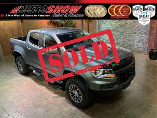 <b>*** AS NEW 6,500KMS!! - LOCAL TOP OF THE LINE ZR2 OFFROAD EDITION!! *** HEATED LEATHER & WHEEL, NAVIGATION, DUAL LOCKING DIFFS!! BOSE PREMIUM STEREO, REMOTE START, REAR SLIDING WINDOW, TOW PACKAGE!! *** </b>Yep, that is not a typo. Just 6,500 kms on this absolutely stunning Top Trim, fully loaded <strong>ZR2 </strong>Colorado!! Local truck purchased new from Birchwood Chevrolet here in Winnipeg! Immaculate Carfax history and in excellent condition overall. Every option you could dream of in a 1/4-ton truck, and then some!! Rugged, capable and luxurious. Get behind the wheel of this beautiful truck kitted and upfitted with the <b>ZR2 PACKAGE </b>w/ <strong>E-</strong><strong>LOCKING FRONT & REAR DIFFERENTIALS</strong>......Offroad Rocker Panel Guards......Off-Road High Clearance Bumpers......Electronic Suspension Dampeners......Fender Flares......<strong>ZR2 GRAPHICS PACKAGE</strong>......Dual <strong>POWER ADJUSTABLE SEATS </strong>w/ Lumbar Support......<strong>LEATHER INTERIOR</strong>......<strong>HEATED STEERING WHEEL</strong>......<strong>BOSE PREMIUM STEREO</strong>......<strong>HEATED SEATS</strong>......<strong>NAVIGATION</strong>......<strong>WIRELESS PHONE CHARGER</strong>......Power <strong>REAR SLIDING WINDOW</strong>......<strong>REMOTE START</strong>......Sport Hood......Hood Protector......Tow Hooks......Factory <strong>SPRAY-IN BEDLINER</strong>......<strong>HID </strong>Projector Headlights......Leather Wheel w/ Media & Cruise Controls......<strong>TOW PACKAGE</strong>......Hill Descent Control......Factory Integrated <strong>TRAILER BRAKE CONTROLLER</strong>......Tow/Haul Mode......Silky Smooth 8-Speed Automatic Transmission......Powerful <strong>3.6L V6 </strong>Engine......Gorgeous <strong>ZR2 17 INCH ALLOY RIMS </strong>w/ <strong>GOODYEAR DURATRAC A/T </strong>Tires!!<br /><br />This ZR2 Colorado comes with all original Books & Manuals, two sets of Keys & Fobs, Fitted All Weather Mats & balance of Factory <strong>CHEVROLET WARRANTY!! </strong>As new with just 6,500 kms!! Now sale priced at just $53,800 with Financing & Extended Warranty available!!<br /><br /><br />Will accept trades. Please call (204)560-6287 or View at 3165 McGillivray Blvd. (Conveniently located two minutes West from Costco at corner of Kenaston and McGillivray Blvd.)<br /><br />In addition to this please view our complete inventory of used <a href=\https://www.autoshowwinnipeg.com/used-trucks-winnipeg/\>trucks</a>, used <a href=\https://www.autoshowwinnipeg.com/used-cars-winnipeg/\>SUVs</a>, used <a href=\https://www.autoshowwinnipeg.com/used-cars-winnipeg/\>Vans</a>, used <a href=\https://www.autoshowwinnipeg.com/new-used-rvs-winnipeg/\>RVs</a>, and used <a href=\https://www.autoshowwinnipeg.com/used-cars-winnipeg/\>Cars</a> in Winnipeg on our website: <a href=\https://www.autoshowwinnipeg.com/\>WWW.AUTOSHOWWINNIPEG.COM</a><br /><br />Complete comprehensive warranty is available for this vehicle. Please ask for warranty option details. All advertised prices and payments plus taxes (where applicable).<br /><br />Winnipeg, MB - Manitoba Dealer Permit # 4908                  <p>Sold to another happy customer</p>