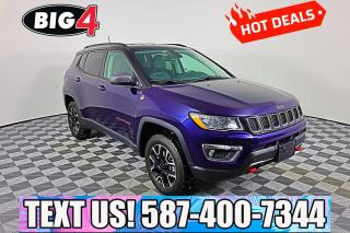 Fly over the toughest terrain in our 2021 Jeep Compass Trailhawk 4X4 thats poised for action in Jazz Blue Pearl w/ Diamond Black Crystal Pearl Two Tone! Powered by a 2.4 Litre Tigershark 4 Cylinder that generates 180hp tethered to an advanced 9 Speed Automatic transmission for the Trail Rated capability of your dreams. This Four Wheel Drive SUV also delivers responsive handling on the pavement with enough efficiency to see approximately 7.8L/100km on the highway. To complement that performance, our Compass comes with automatic quad halogen headlights, fog lamps, bold hood graphics, alloy wheels, and a black roof for a head-turning two-tone look.

Our Trailhawk cabin has been tailor-made to fit your needs with leather front seats with sporty mesh inserts plus a premium wrapped steering wheel, dual-zone automatic climate control, cruise control, and our Uconnect technology with an 8.4-inch touchscreen, voice activation, Android Auto, Apple CarPlay, Bluetooth, and a six-speaker audio system.

Drive with confidence, knowing Jeep protects you with a backup camera, blind-spot monitor, automatic braking, adaptive cruise control, and more. Our Compass Trailhawk opens up a world of possibilities that are just waiting for you to explore. Save this Page and Call for Availability. We Know You Will Enjoy Your Test Drive Towards Ownership!