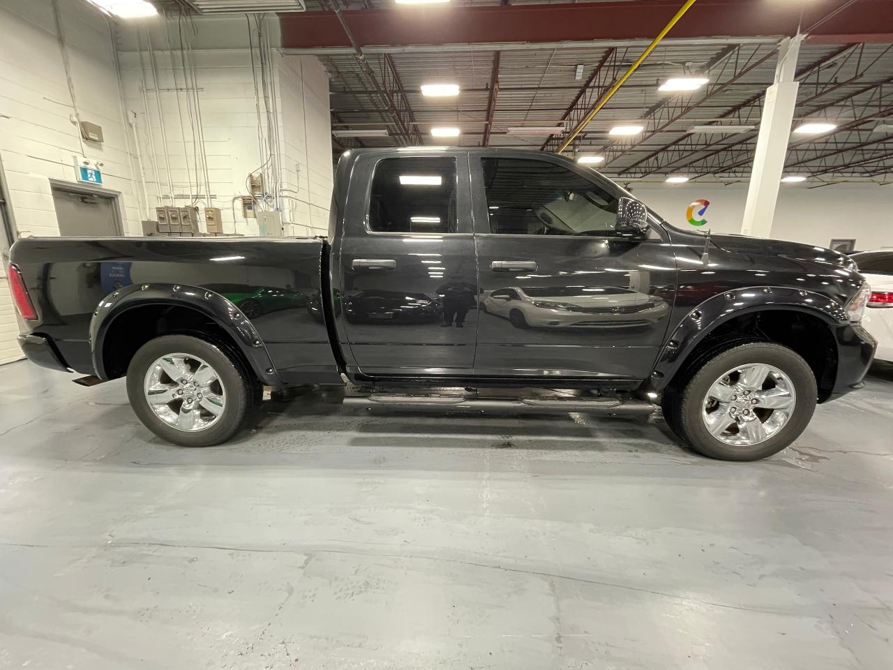 2017 RAM 1500 4WD Quad Cab 140.5" - Photo #6