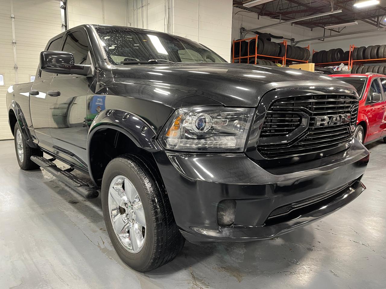 2017 RAM 1500 4WD Quad Cab 140.5" - Photo #7