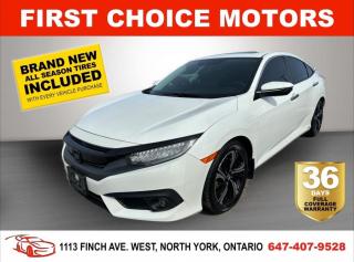Welcome to First Choice Motors, the largest car dealership in Toronto of pre-owned cars, SUVs, and vans priced between $5000-$15,000. With an impressive inventory of over 300 vehicles in stock, we are dedicated to providing our customers with a vast selection of affordable and reliable options.<br><br>Were thrilled to offer a used 2018 Honda Civic TOURING, white color with 183,000km (STK#7103) This vehicle was $17990 NOW ON SALE FOR $15990. It is equipped with the following features:<br>- Automatic Transmission<br>- Leather seats<br>- Sunroof<br>- Heated seats<br>- Navigation<br>- Bluetooth<br>- Reverse camera<br>- Alloy wheels<br>- Power windows<br>- Power locks<br>- Power mirrors<br>- Air Conditioning<br><br>At First Choice Motors, we believe in providing quality vehicles that our customers can depend on. All our vehicles come with a 36-day FULL COVERAGE warranty. We also offer additional warranty options up to 5 years for our customers who want extra peace of mind.<br><br>Furthermore, all our vehicles are sold fully certified with brand new brakes rotors and pads, a fresh oil change, and brand new set of all-season tires installed & balanced. You can be confident that this car is in excellent condition and ready to hit the road.<br><br>At First Choice Motors, we believe that everyone deserves a chance to own a reliable and affordable vehicle. Thats why we offer financing options with low interest rates starting at 7.9% O.A.C. Were proud to approve all customers, including those with bad credit, no credit, students, and even 9 socials. Our finance team is dedicated to finding the best financing option for you and making the car buying process as smooth and stress-free as possible.<br><br>Our dealership is open 7 days a week to provide you with the best customer service possible. We carry the largest selection of used vehicles for sale under $9990 in all of Ontario. We stock over 300 cars, mostly Hyundai, Chevrolet, Mazda, Honda, Volkswagen, Toyota, Ford, Dodge, Kia, Mitsubishi, Acura, Lexus, and more. With our ongoing sale, you can find your dream car at a price you can afford. Come visit us today and experience why we are the best choice for your next used car purchase!<br><br>All prices exclude a $10 OMVIC fee, license plates & registration and ONTARIO HST (13%)