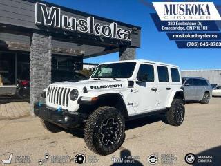 This Jeep Wrangler 4xe Unlimited Rubicon, with a Intercooled Turbo Gas/Electric I-4 2.0 L/122 engine, features a 8-Speed Automatic w/OD transmission, and generates 0 highway/0 city L/100km. Find this vehicle with only 66490 kilometers!  Jeep Wrangler 4xe Unlimited Rubicon Options: This Jeep Wrangler 4xe Unlimited Rubicon offers a multitude of options. Technology options include: 2 LCD Monitors In The Front, AM/FM/HD/Satellite w/Seek-Scan, Clock, Speed Compensated Volume Control, Aux Audio Input Jack, Steering Wheel Controls, Voice Activation, Radio Data System and Uconnect External Memory Control, Radio: Uconnect 4C Nav w/8.4 Display, Siriusxm Traffic Real-Time Traffic Display, Voice Activated Dual Zone Front Automatic Air Conditioning.  Safety options include Tailgate/Rear Door Lock Included w/Power Door Locks, Variable Intermittent Wipers, 2 LCD Monitors In The Front, Power Door Locks w/Autolock Feature, Airbag Occupancy Sensor.  Visit Us: Find this Jeep Wrangler 4xe Unlimited Rubicon at Muskoka Chrysler today. We are conveniently located at 380 Ecclestone Dr Bracebridge ON P1L1R1. Muskoka Chrysler has been serving our local community for over 40 years. We take pride in giving back to the community while providing the best customer service. We appreciate each and opportunity we have to serve you, not as a customer but as a friend