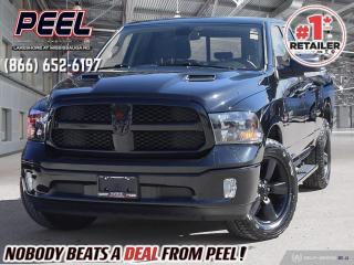 2021 Ram 1500 SLT Quad Cab 4X4 | 5.7L Hemi V8 | Diamond Black Crystal Pearl | Bucket Seats | Luxury Group | Black Appearance Group | Heated Seats | Heated Steering Wheel | Remote Start | Uconnect 4C 8.4" Touchscreen | Apple CarPlay & Android Auto | 9 Alpine Speakers w/ Subwoofer | Class IV Hitch Receiver | 3.92 Rear Axle | Trailer Brake Control | Rear Power Sliding Window | Side Steps | Soft Tri-fold Tonneau Cover | Husky Floor Liners | Sport Performance Hood 

One Owner Clean Carfax

Introducing the 2021 Ram 1500 SLT Quad Cab 4X4, a formidable truck designed to elevate your driving experience to new heights. Powered by a robust 5.7L Hemi V8 engine, this Ram delivers impressive performance and towing capabilities, making it perfect for both work and play. Finished in striking Diamond Black Crystal Pearl, its sleek exterior is complemented by the sleek Sport Performance Hood and Black Appearance Group, exuding confidence and style on the road. Slip into the luxurious Bucket Seats and indulge in the comfort of the Heated Seats and Heated Steering Wheel, perfect for those chilly mornings. Stay connected and entertained with the Uconnect 4C 8.4" Touchscreen featuring Apple CarPlay and Android Auto integration, while the 9 Alpine Speakers with Subwoofer deliver an immersive audio experience. Equipped with practical features like the Class IV Hitch Receiver, Trailer Brake Control, and Rear Power Sliding Window, this Ram is ready to tackle any task with ease. Complete with convenient additions like Side Steps, Soft Tri-fold Tonneau Cover, and Husky Floor Liners, the 2021 Ram 1500 SLT Quad Cab 4X4 is the epitome of versatility and functionality, making it the ideal companion for your everyday adventures.
______________________________________________________

Engage & Explore with Peel Chrysler: Whether youre inquiring about our latest offers or seeking guidance, 1-866-652-6197 connects you directly. Dive deeper online or connect with our team to navigate your automotive journey seamlessly.

WE TAKE ALL TRADES & CREDIT. WE SHIP ANYWHERE IN CANADA! OUR TEAM IS READY TO SERVE YOU 7 DAYS! COME SEE WHY NOBODY BEATS A DEAL FROM PEEL! Your Source for ALL make and models used cars and trucks
______________________________________________________

*FREE CarFax (click the link above to check it out at no cost to you!)*

*FULLY CERTIFIED! (Have you seen some of these other dealers stating in their advertisements that certification is an additional fee? NOT HERE! Our certification is already included in our low sale prices to save you more!)

______________________________________________________

Peel Chrysler  A Trusted Destination: Based in Port Credit, Ontario, we proudly serve customers from all corners of Ontario and Canada including Toronto, Oakville, North York, Richmond Hill, Ajax, Hamilton, Niagara Falls, Brampton, Thornhill, Scarborough, Vaughan, London, Windsor, Cambridge, Kitchener, Waterloo, Brantford, Sarnia, Pickering, Huntsville, Milton, Woodbridge, Maple, Aurora, Newmarket, Orangeville, Georgetown, Stouffville, Markham, North Bay, Sudbury, Barrie, Sault Ste. Marie, Parry Sound, Bracebridge, Gravenhurst, Oshawa, Ajax, Kingston, Innisfil and surrounding areas. On our website www.peelchrysler.com, you will find a vast selection of new vehicles including the new and used Ram 1500, 2500 and 3500. Chrysler Grand Caravan, Chrysler Pacifica, Jeep Cherokee, Wrangler and more. All vehicles are priced to sell. We deliver throughout Canada. website or call us 1-866-652-6197. 

Your Journey, Our Commitment: Beyond the transaction, Peel Chrysler prioritizes your satisfaction. While many of our pre-owned vehicles come equipped with two keys, variations might occur based on trade-ins. Regardless, our commitment to quality and service remains steadfast. Experience unmatched convenience with our nationwide delivery options. All advertised prices are for cash sale only. Optional Finance and Lease terms are available. A Loan Processing Fee of $499 may apply to facilitate selected Finance or Lease options. If opting to trade an encumbered vehicle towards a purchase and require Peel Chrysler to facilitate a lien payout on your behalf, a Lien Payout Fee of $299 may apply. Contact us for details. Peel Chrysler Pre-Owned Vehicles come standard with only one key.