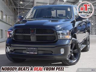 2021 Ram 1500 SLT Quad Cab 4X4 | 5.7L Hemi V8 | Diamond Black Crystal Pearl | Bucket Seats | Luxury Group | Black Appearance Group | Heated Seats | Heated Steering Wheel | Remote Start | Uconnect 4C 8.4" Touchscreen | Apple CarPlay & Android Auto | 9 Alpine Speakers w/ Subwoofer | Class IV Hitch Receiver | 3.92 Rear Axle | Trailer Brake Control | Rear Power Sliding Window | Side Steps | Soft Tri-fold Tonneau Cover | Husky Floor Liners | Sport Performance Hood 

One Owner Clean Carfax

Introducing the 2021 Ram 1500 SLT Quad Cab 4X4, a formidable truck designed to elevate your driving experience to new heights. Powered by a robust 5.7L Hemi V8 engine, this Ram delivers impressive performance and towing capabilities, making it perfect for both work and play. Finished in striking Diamond Black Crystal Pearl, its sleek exterior is complemented by the sleek Sport Performance Hood and Black Appearance Group, exuding confidence and style on the road. Slip into the luxurious Bucket Seats and indulge in the comfort of the Heated Seats and Heated Steering Wheel, perfect for those chilly mornings. Stay connected and entertained with the Uconnect 4C 8.4" Touchscreen featuring Apple CarPlay and Android Auto integration, while the 9 Alpine Speakers with Subwoofer deliver an immersive audio experience. Equipped with practical features like the Class IV Hitch Receiver, Trailer Brake Control, and Rear Power Sliding Window, this Ram is ready to tackle any task with ease. Complete with convenient additions like Side Steps, Soft Tri-fold Tonneau Cover, and Husky Floor Liners, the 2021 Ram 1500 SLT Quad Cab 4X4 is the epitome of versatility and functionality, making it the ideal companion for your everyday adventures.
______________________________________________________

Engage & Explore with Peel Chrysler: Whether youre inquiring about our latest offers or seeking guidance, 1-866-652-6197 connects you directly. Dive deeper online or connect with our team to navigate your automotive journey seamlessly.

WE TAKE ALL TRADES & CREDIT. WE SHIP ANYWHERE IN CANADA! OUR TEAM IS READY TO SERVE YOU 7 DAYS! COME SEE WHY NOBODY BEATS A DEAL FROM PEEL! Your Source for ALL make and models used cars and trucks
______________________________________________________

*FREE CarFax (click the link above to check it out at no cost to you!)*

*FULLY CERTIFIED! (Have you seen some of these other dealers stating in their advertisements that certification is an additional fee? NOT HERE! Our certification is already included in our low sale prices to save you more!)

______________________________________________________

Peel Chrysler  A Trusted Destination: Based in Port Credit, Ontario, we proudly serve customers from all corners of Ontario and Canada including Toronto, Oakville, North York, Richmond Hill, Ajax, Hamilton, Niagara Falls, Brampton, Thornhill, Scarborough, Vaughan, London, Windsor, Cambridge, Kitchener, Waterloo, Brantford, Sarnia, Pickering, Huntsville, Milton, Woodbridge, Maple, Aurora, Newmarket, Orangeville, Georgetown, Stouffville, Markham, North Bay, Sudbury, Barrie, Sault Ste. Marie, Parry Sound, Bracebridge, Gravenhurst, Oshawa, Ajax, Kingston, Innisfil and surrounding areas. On our website www.peelchrysler.com, you will find a vast selection of new vehicles including the new and used Ram 1500, 2500 and 3500. Chrysler Grand Caravan, Chrysler Pacifica, Jeep Cherokee, Wrangler and more. All vehicles are priced to sell. We deliver throughout Canada. website or call us 1-866-652-6197. 

Your Journey, Our Commitment: Beyond the transaction, Peel Chrysler prioritizes your satisfaction. While many of our pre-owned vehicles come equipped with two keys, variations might occur based on trade-ins. Regardless, our commitment to quality and service remains steadfast. Experience unmatched convenience with our nationwide delivery options. All advertised prices are for cash sale only. Optional Finance and Lease terms are available. A Loan Processing Fee of $499 may apply to facilitate selected Finance or Lease options. If opting to trade an encumbered vehicle towards a purchase and require Peel Chrysler to facilitate a lien payout on your behalf, a Lien Payout Fee of $299 may apply. Contact us for details. Peel Chrysler Pre-Owned Vehicles come standard with only one key.