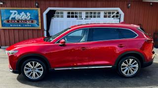<p><strong>2023 MAZDA CX-9 SIGNATURE SERIES AWD. 6 PASSENGER. ONLY 14,000 KMS!! SOUL RED CRYSTAL METALLIC WITH CHESTNUT BROWN NAPA LEATHER SEATS & SANTOS ROSEWOOD TRIM! 2.5 LTR. 4 CYL TURBO WITH A SKYACTIV 6 SPEED TRANSMISSION. 3,500 TOW CAPACITY! ONE PREVIOUS ONTARIO OWNER. CARFAX CANADA CLEAN......NO ACCIDENTS. LIKE BRAND NEW CONDITION! 2 SETS OF SMART PROXIMITY KEYS. SO MANY OPTIONS INCLUDING KICK TO OPEN POWER REAR TAILGATE. BOSE SOUND SYSTEM WITH 12 SPEAKERS & SUBWOOFER! HEATED & COOLED LEATHER SEATS. APPLE CAR PLAY & ANDROID AUTO. 20 ALLOY WHEELS. OVERHEAD VIEW & REAR VIEW CAMERA. BOTH FRONT POWER SEATS WITH LUMBAR ADJUST. POWER SUNROOF. FRONT RAIN SENSOR WIPERS. HEATED STEERING WHEEL & MUCH MORE! DOWNLOAD THE MYMAZDA MOBILE APP FOR REMOTE START AND VEHICLE INFORMATION ON YOUR CELL! BALANCE OF MAZDA WARRANTY....IN SERVICE DATE: JAN. 4, 2023. 3YR/UNLIMITED KMS B TO B & 5YR/UNLIMITED KMS POWER TRAIN. WAS $47,995.00.....NOW $46,995.00. (hst & mto fees not included) CONTACT CHRIS @ 905-774-1965 or petescarsales@gmail.com. www.petescarsales.com. RBC FINANCING AVAILABLE (call for details). </strong></p>
