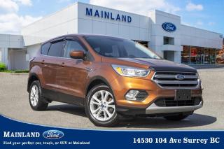 <p><strong><span style=font-family:Arial; font-size:18px;>Experience the thrill of the journey with our 2017 Ford Escape SE, an SUV that promises to redefine your driving experience..</span></strong></p> <p><strong><span style=font-family:Arial; font-size:18px;>Cruise through lifes twists and turns in this stylish and efficient vehicle, loaded with features that promise a ride unlike any other..</span></strong> <br> With a sleek brown exterior that mirrors the richness of a perfectly crafted espresso, its allure is undeniable.. This pre-loved gem has been meticulously maintained and has travelled 133,200 km, ready to embark on new adventures with you.</p> <p><strong><span style=font-family:Arial; font-size:18px;>Under the hood, the 1.5L 4-cylinder engine paired with a 6-speed automatic transmission guarantees a smooth and powerful drive..</span></strong> <br> Youll appreciate the precision of its speed-sensing steering, the reassuring grip of traction control, and the stability offered by four-wheel independent suspension.. Inside, the Ford Escape SE is all about comfort and convenience.</p> <p><strong><span style=font-family:Arial; font-size:18px;>With heated front seats and automatic temperature control, every journey is a soothing experience..</span></strong> <br> Illuminated entry and an overhead console add a luxurious touch, while the trip computer and compass keep you informed and oriented.. This Ford Escape SE also boasts a plethora of safety features.</p> <p><strong><span style=font-family:Arial; font-size:18px;>Protecting you and your loved ones are dual front impact and side airbags, as well as an ignition disable and panic alarm system..</span></strong> <br> The SUV is also equipped with a rear exterior parking camera, adding an extra layer of security.. Listen to your favourite tunes with the CD-MP3 decoder and AM/FM radio, all controlled via steering wheel mounted audio controls for your convenience.</p> <p><strong><span style=font-family:Arial; font-size:18px;>Meanwhile, power windows, remote keyless entry and alloy wheels enhance your driving experience, ensuring every journey is as enjoyable as possible..</span></strong> <br> At Mainland Ford, we believe in diversity and inclusion.. We understand your needs and we speak your language.</p> <p><strong><span style=font-family:Arial; font-size:18px;>Come visit us today and let us introduce you to the Ford Escape SE, a vehicle that stands tall amidst the competition..</span></strong> <br> So why wait? Escape the ordinary and step into extraordinary.. Embrace the freedom, embrace the journey, embrace the 2017 Ford Escape SE</p><hr />
<p><br />
<br />
To apply right now for financing use this link:<br />
<a href=https://www.mainlandford.com/credit-application/>https://www.mainlandford.com/credit-application</a><br />
<br />
Looking for a new set of wheels? At Mainland Ford, all of our pre-owned vehicles are Mainland Ford Certified. Every pre-owned vehicle goes through a rigorous 96-point comprehensive safety inspection, mechanical reconditioning, up-to-date service including oil change and professional detailing. If that isnt enough, we also include a complimentary Carfax report, minimum 3-month / 2,500 km Powertrain Warranty and a 30-day no-hassle exchange privilege. Now that is peace of mind. Buy with confidence here at Mainland Ford!<br />
<br />
Book your test drive today! Mainland Ford prides itself on offering the best customer service. We also service all makes and models in our World Class service center. Come down to Mainland Ford, proud member of the Trotman Auto Group, located at 14530 104 Ave in Surrey for a test drive, and discover the difference!<br />
<br />
*** All pre-owned vehicle sales are subject to a $599 documentation fee, $149 Fuel Surcharge, $599 Safety and Convenience Fee and $500 Finance Placement Fee (if applicable) plus applicable taxes. ***<br />
<br />
VSA Dealer# 40139</p>

<p>*All prices plus applicable taxes, applicable environmental recovery charges, documentation of $599 and full tank of fuel surcharge of $76 if a full tank is chosen. <br />Other protection items available that are not included in the above price:<br />Tire & Rim Protection and Key fob insurance starting from $599<br />Service contracts (extended warranties) for coverage up to 7 years and 200,000 kms starting from $599<br />Custom vehicle accessory packages, mudflaps and deflectors, tire and rim packages, lift kits, exhaust kits and tonneau covers, canopies and much more that can be added to your payment at time of purchase<br />Undercoating, rust modules, and full protection packages starting from $199<br />Financing Fee of $500 when applicable<br />Flexible life, disability and critical illness insurances to protect portions of or the entire length of vehicle loan</p>