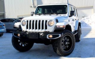 <div>Under Jeeps 5-Year / 100,000km Powertrain Warranty Coverage.<br><br><br>Cold Weather Group:<br><br>Remote Start System<br>Heated Steering Wheel<br>Heated Front Seats<br><br><br>Leather-Wrapped Steering Wheel<br>Embroidered Sahara Emblem on Front Seats<br>Push-Start Ignition<br>7 Full-Colour Driver Information Display<br>Uconnect 4 Multimedia Centre w/ 7 Touchscreen<br>Apple CarPlay & Android Auto Compatibility<br>Handsfree Bluetooth Calling & Audio Streaming<br>SiriusXM Satellite Radio<br>Auxiliary & USB Inputs<br>USB-C Input<br>8-Speaker Sound System w/ Overhead Soundbar<br>Manual Adjustable Lumbar Support<br>Power Windows<br>Power Mirrors<br>Power Locks<br>Air Conditioning<br>Automatic Dual-Zone Climate Controls<br><br><br>Exterior Features:<br><br>Remote Keyless Entry<br>Automatic Halogen Headlamps<br>Fog Lamps<br>Black Freedom Top Modular Hardtop<br>Full-Framed Removable Doors<br>Side Steps<br>Body-Colour Fender Flares<br>Unique Front & Rear Bumpers w/ Silver Bezels<br>Skid Plates for Fuel Tank & Transfer Case<br>Front & Rear Tow Hooks<br>Heated Mirrors<br>Rear Privacy Glass<br>20 Alloy Wheels<br><br><br>Drivers Assistance:<br><br>ParkView Rear Back-Up Camera<br>Electronic Stability Control (ESC)<br>Hill Start Assist (HSA)<br>Electronic Roll Mitigation (ERM)<br>Cruise Control<br>Universal Garage Door Opener<br><br><br>Performance Features:<br><br>Command-Trac 4x4 System<br>2.0L - 4 Cylinder Turbocharged Engine<br>270hp/ 295lb-ft Torque<br>Automatic Transmission<br><br><br>Tire Size: 35X12.50R20LT<br>Tire Brand: Atturo Trail Blade X/T<br>Rim Size: 20-Inch<br>Rim Brand: Cali Off-Road Dirty Wheel w/ Milled Finish<br>Shock/ Lift Brand: Zone Offroad<br><br><br>Honesty Pricing eliminates the haggle hassle by providing you with our lowest possible selling price up front. In fact, it is the lowest price in our market, and we will prove it by disclosing a comprehensive market report of what our competitors are selling similar vehicles for.<br><br> This vehicle meets our Diamond Certification standard, which begins by selecting only premium quality vehicles and subjecting them to a much more comprehensive inspection process than typical dealerships use. Diamond Certified ensures a clean history, exceptional appearance and problem-free operation. <br><br> At Saskatoon Auto Connection we sell pre-owned automobiles the way we would like to buy them ourselves. Since 2008, we have been dedicated to providing the highest level of integrity and transparency in our industry, in combination with the highest quality vehicles at the most competitive prices in Saskatchewan. Our friendly staff is ready to positively redefine your expectations of the pre-owned automobile space.<br><br></div>