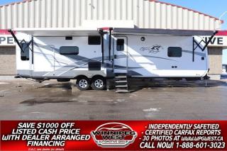 **Cash Price: $45,800 Finance Price: $44,800 (SAVE $1,000 OFF THE LISTED CASH PRICE WITH DEALER ARRANGED FINANCING! O.A.C.) Plus PST/GST. No Administration Fees!!** Free CARFAX Vehicle History Report available on every RV!  

ITS MORE THAN LUXURY AND HIGH END FINISHES... ITS QUALITY CONSTRUCTION LIKE NO OTHER! TRAVEL IN COMFORT AND STYLE WITH THIS HIGH END 3 SLIDE, LARGE REAR LUXURYLOUNGE, RESIDENTIAL QUALITY RV. THIS IS QUALITY, AND IT IS PRICED TO SELL!! This RV oozes elegance and offers more upgrades than most any other RV youll see on the market. STILL AS NEW IN ALL RESPECTS -  2021 HIGHLAND RIDGE OPEN RANGE 322RLS with a high end rear lounge and master chef kitchen! It boasts 3 Big Slides and from the appliances to the carpeting, its still like new in all respects.

You can definitely entertain with this 38ft 2021 HIGHLAND RIDGE OPEN RANGE 322RLS! This unit features a high end rear lounge and entertainment space with electric fireplace and big flat screen TV, deluxe Chef  kitchen, triple slides, a queen size private front Master bedroom, in suite washer/dryer and fully equipped outside kitchen!!

Step inside and be blown away by the high end residential finishes. The location of the deluxe bathroom is almost directly opposite the door, so no dirty feet in and through your new home.  Here you will enjoy a large shower, toilet, and vanity with sink, plus overhead medicine cabinet too.  

Through the door at the end of the hall, just outside the bathroom to your left, step into the Private master bedroom which features a comfortable Queen size bed slide out including overhead storage. The slide provides added foot traffic space around the bed, and there is ample storage for your clothing with a dresser along the curb side, and a full wall master closet along the front. Already equipped with the in suite washer and dryer combo and Flat screen TV.

Back to the entry door immediate left just inside the door, a slide out along the curb side featuring the Chefs kitchen and a Large entertainment center with a large flat screen TV included, an included Stereo and huge fireplace!! This is  a true gourmets dream kitchen! Theres so much room and a LOT OF STORAGE thanks to the  Slide pushing out the kitchen galley wall. It really opens the space and gives it a warm homey feel. That warmth youll feel comes in part from the real wood cabinetry, trim and fascia along with the Corian solid surface counter tops, stove and sink covers. Youll enjoy all the amenities of home with double door refrigerator and freezer, a 3 burner stove with oven, over mount microwave and deep floor-to-ceiling pantries, and there is  lots of counter-top space for cooking and food prep with the off set island including a large sink and added counter-top prep space, plus more.. The Chef in the family will absolutely love being in this space. Theyll also enjoy being open to the entertaining area but not IN IT! 

Adjacent along the rear wall there is more storage and tri-fold sofa sleeper that can double as a bed for any overnight family or guests.. When you are done cooking you can sit down and enjoy your meal at the free standing dinette found within the road side slide. There is also more seating here for relaxing and hanging out with a theater seat for two. 

There are  High Efficiency LED interior lights throughout the RV making it bright and cozy. Moving outside there are 2 large power awnings to cover you on those hot or rainy days and Air conditioning for the hot summer nights! There is lots of outdoor storage, an outdoor shower and best of all it has a a fully equipped high end outside kitchen  including fridge, sink, griddle and BBQ hook up. This RV is easy to set up and is equipped with power front and rear leveling jacks and a power front hitch. And you can even RV longer into the season with  the  enclosed and heated underbelly so RV late into the season if you would like!   This RV is  Perfect for Vacationing, Adventuring or just Relaxing on a seasonal lot here or down south where it is warm - it has a great high end entertaining layout and is loaded with high end features. This is a very high end RV with High end finish and features would expect in a luxury home. 1st Class in all respects. The list of features and upgraded is to long to list - Must See - Absolutely still as new in all respects. A true must see - you will not be disappointed!! 

We have completed a Safety Inspection based on the Manitoba Fire Commissioners Office guidelines.  This RV comes with a Clean, No Accident 1-owner  CARFAX history report and we have several extended warranty options available to choose from to protect your RV and your wallet.  ON SALE NOW (HUGE VALUE!!!) Zero down and very low payment financing available OAC. Please see dealer for details. Trades accepted. View at Winnipeg West Automotive Group, 5195 Portage Ave. Dealer permit# 4365, Call now 1(888) 601-3023.