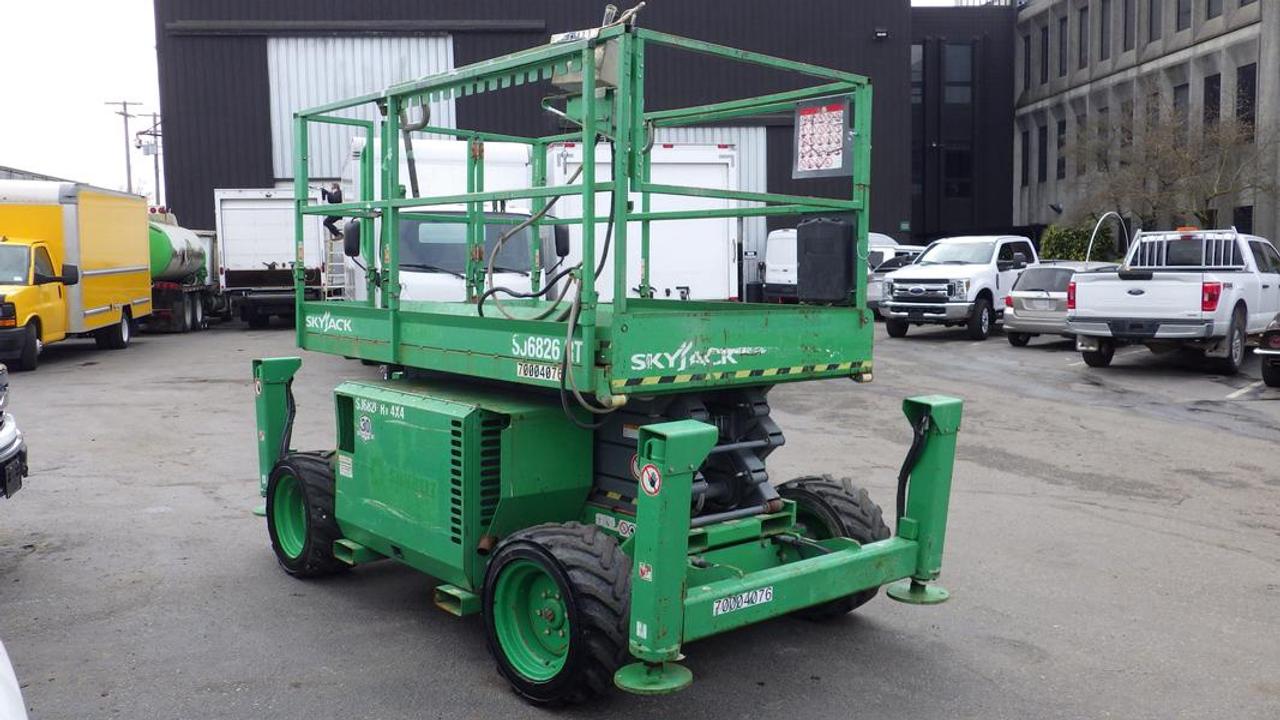 2015 Skyjack SJ6826RT Scissor Lift, Diesel, 4 wheel Drive  green exterior, black interior, vinyl. Certification Decal to February 2025  $23,820.00 plus $375 processing fee, $24,195.00 total payment obligation before taxes.  Listing report, warranty, contract commitment cancellation fee, financing available on approved credit (some limitations and exceptions may apply). All above specifications and information is considered to be accurate but is not guaranteed and no opinion or advice is given as to whether this item should be purchased. We do not allow test drives due to theft, fraud, acts of vandalism and undetectable impaired driving. Instead we provide the following benefits: Complimentary Warranty (with options to extend), Limited Money Back Satisfaction Guarantee on Fully Completed Contracts, Contract Commitment Cancellation, and an Open-Ended Sell-Back Option. Ask seller for details or call 604-522-REPO(7376) to confirm listing availability.