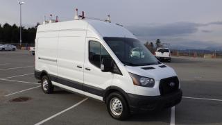 2021 Ford Transit 250 Van High Roof Cargo Van  148-inch WheeBase All Wheel Drive , 3.5L V6 DOHC 24V engine, 6 cylinder, 2 door, Automatic, cruise control, air conditioning, AM/FM radio, CD player, power door locks, power windows, power mirrors, white exterior, black interior, cloth. (Luxury tax will apply on to British Columbia purchasers) $58,790.00 plus $375 processing fee, $59,165.00 total payment obligation before taxes.  Listing report, warranty, contract commitment cancellation fee, financing available on approved credit (some limitations and exceptions may apply). All above specifications and information is considered to be accurate but is not guaranteed and no opinion or advice is given as to whether this item should be purchased. We do not allow test drives due to theft, fraud and acts of vandalism. Instead we provide the following benefits: Complimentary Warranty (with options to extend), Limited Money Back Satisfaction Guarantee on Fully Completed Contracts, Contract Commitment Cancellation, and an Open-Ended Sell-Back Option. Ask seller for details or call 604-522-REPO(7376) to confirm listing availability.