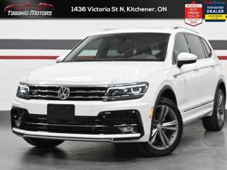 <b>Apple Carplay, Android Auto, R-Line, Fender Audio, Navigation, Panoramic Roof, Digital Dash, Leather, Heated Seats and Steering Wheel, Lane Keep Assist, Blindspot Assist, Forward Collision Warning, Park Aid, Remote Start!<br> <br></b><br>  Tabangi Motors is family owned and operated for over 20 years and is a trusted member of the UCDA. Our goal is not only to provide you with the best price, but, more importantly, a quality, reliable vehicle, and the best customer service. Serving the Kitchener area, Tabangi Motors, located at 1436 Victoria St N, Kitchener, ON N2B 3E2, Canada, is your premier retailer of Preowned vehicles. Our dedicated sales staff and top-trained technicians are here to make your auto shopping experience fun, easy and financially advantageous. Please utilize our various online resources and allow our excellent network of people to put you in your ideal car, truck or SUV today! <br><br>Tabangi Motors in Kitchener, ON treats the needs of each individual customer with paramount concern. We know that you have high expectations, and as a car dealer we enjoy the challenge of meeting and exceeding those standards each and every time. Allow us to demonstrate our commitment to excellence! Call us at 905-670-3738 or email us at customercare@tabangimotors.com to book an appointment. <br><hr></hr>CERTIFICATION: Have your new pre-owned vehicle certified at Tabangi Motors! We offer a full safety inspection exceeding industry standards including oil change and professional detailing prior to delivery. Vehicles are not drivable, if not certified. The certification package is available for $595 on qualified units (Certification is not available on vehicles marked As-Is). All trade-ins are welcome. Taxes and licensing are extra.<br><hr></hr><br> <br><iframe width=100% height=350 src=https://www.youtube.com/embed/W7zxx_S8F18?si=ZwJrZmNPuGjOlpZX title=YouTube video player frameborder=0 allow=accelerometer; autoplay; clipboard-write; encrypted-media; gyroscope; picture-in-picture; web-share allowfullscreen></iframe>  <br><br> The VW Tiguan aces real-world utility with its excellent outward vision, comfortable interior, and supreme on road capabilities. This  2020 Volkswagen Tiguan is for sale today in Kitchener. <br> <br>The weekend warrior! As one of the most minimalist styled crossover SUVs, the Tiguan is the winner of elegance in its competition. Crisp lines, a luxurious ride quality and the largest interior within its class give this Tiguan the high marks as the leader of the crossover SUV segment.This  SUV has 56,040 kms. Its  white in colour  . It has a 8 speed automatic transmission and is powered by a  184HP 2.0L 4 Cylinder Engine.  It may have some remaining factory warranty, please check with dealer for details. <br> <br> Our Tiguans trim level is Highline. This range topping Tiguan Highline comes fully loaded with unique alloy wheels, a premium Fender audio system, panoramic sunroof, satellite navigation, a heated leather steering wheel and heated leather seats, forward collision warning, and autonomous emergency braking. It also includes blind spot detection, chrome exterior trim, an 8 inch touchscreen display, App-Connect smartphone integration Apple CarPlay, Android Auto and streaming audio, remote keyless entry, a rear view camera and much more.<br> <br>To apply right now for financing use this link : <a href=https://kitchener.tabangimotors.com/apply-now/ target=_blank>https://kitchener.tabangimotors.com/apply-now/</a><br><br> <br/><br><hr></hr>SERVICE: Schedule an appointment with Tabangi Service Centre to bring your vehicle in for all its needs. Simply click on the link below and book your appointment. Our licensed technicians and repair facility offer the highest quality services at the most competitive prices. All work is manufacturer warranty approved and comes with 2 year parts and labour warranty. Start saving hundreds of dollars by servicing your vehicle with Tabangi. Call us at 905-670-8100 or follow this link to book an appointment today! https://calendly.com/tabangiservice/appointment. <br><hr></hr>PRICE: We believe everyone deserves to get the best price possible on their new pre-owned vehicle without having to go through uncomfortable negotiations. By constantly monitoring the market and adjusting our prices below the market average you can buy confidently knowing you are getting the best price possible! No haggle pricing. No pressure. Why pay more somewhere else?<br><hr></hr>WARRANTY: This vehicle qualifies for an extended warranty with different terms and coverages available. Dont forget to ask for help choosing the right one for you.<br><hr></hr>FINANCING: No credit? New to the country? Bankruptcy? Consumer proposal? Collections? You dont need good credit to finance a vehicle. Bad credit is usually good enough. Give our finance and credit experts a chance to get you approved and start rebuilding credit today!<br> o~o