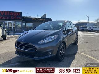 <b>Heated Seats,  Aluminum Wheels,  Heated Mirrors,  SYNC,  Remote Keyless Entry!</b><br> <br> We sell high quality used cars, trucks, vans, and SUVs in Saskatoon and surrounding area.<br> <br>   This 2019 Ford Fiesta is a top choice for driving enjoyment, with agile handling and amazing on road control. This  2019 Ford Fiesta is for sale today. <br> <br>With compact dimensions, this 2019 Ford Fiesta offers everything you might need from a small city car. Practicality is everything, and with the versatile, modern interior, it is easy to adjust your Fiesta to your specific needs. It offers nimble highly agile handling, and unlike any other cub-compacts, the on-road control is like that of a sports car!This  sedan has 154,429 kms. Its  grey in colour  . It has a 5 speed manual transmission and is powered by a  120HP 1.6L 4 Cylinder Engine.  <br> <br> Our Fiestas trim level is SE Sedan. Upgrade to this Fiesta SE and youll receive stylish aluminum wheels, heated front seats with unique cloth material, power heated side mirrors, Fords Mykey system, automatic air conditioning, cruise control, power front and rear windows and piano black interior trim. It also comes with SYNC communications & entertainment system paired with a 6 speaker audio system and a 4.2 inch center display, Bluetooth connectivity, remote keyless entry, a 60/40 split rear seat, power door locks, multiple safety airbags, a rear view camera and much more. This vehicle has been upgraded with the following features: Heated Seats,  Aluminum Wheels,  Heated Mirrors,  Sync,  Remote Keyless Entry,  Rear View Camera,  Streaming Audio. <br> To view the original window sticker for this vehicle view this <a href=http://www.windowsticker.forddirect.com/windowsticker.pdf?vin=3FADP4BJ6KM136228 target=_blank>http://www.windowsticker.forddirect.com/windowsticker.pdf?vin=3FADP4BJ6KM136228</a>. <br/><br> <br>To apply right now for financing use this link : <a href=https://www.villageauto.ca/car-loan/ target=_blank>https://www.villageauto.ca/car-loan/</a><br><br> <br/><br> Buy this vehicle now for the lowest bi-weekly payment of <b>$114.43</b> with $0 down for 84 months @ 5.99% APR O.A.C. ( Plus applicable taxes -  Plus applicable fees   ).  See dealer for details. <br> <br><br> Village Auto Sales has been a trusted name in the Automotive industry for over 40 years. We have built our reputation on trust and quality service. With long standing relationships with our customers, you can trust us for advice and assistance on all your motoring needs. </br>

<br> With our Credit Repair program, and over 250 well-priced vehicles in stock, youll drive home happy, and thats a promise. We are driven to ensure the best in customer satisfaction and look forward working with you. </br> o~o