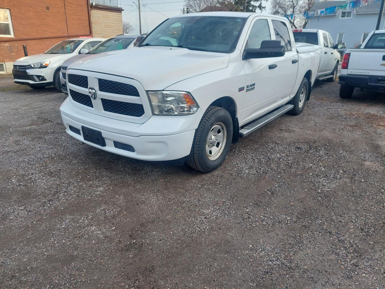 2015 RAM 1500 4WD Crew Cab 140.5" - Photo #2