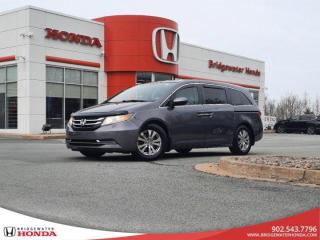 Recent Arrival! Gray 2015 Honda Odyssey EX FWD 6-Speed Automatic 3.5L V6 SOHC i-VTEC 24V Bridgewater Honda, Located in Bridgewater Nova Scotia. Timing Belt completed during reconditioning.Odyssey EX, 4D Passenger Van, 6-Speed Automatic, 17 Alloy Wheels, 3rd row seats: split-bench, 4-Wheel Disc Brakes, 7 Speakers, ABS brakes, Air Conditioning, Anti-whiplash front head restraints, Automatic temperature control, Backup Camera, Brake assist, Bumpers: body-colour, CD player, Cloth Seat Trim, Compass, Cruise Control, Delay-off headlights, Driver door bin, Driver vanity mirror, Drivers Seat Mounted Armrest, Dual front impact airbags, Dual front side impact airbags, Electronic Stability Control, Four wheel independent suspension, Front anti-roll bar, Front Bucket Seats, Front dual zone A/C, Front reading lights, Fully automatic headlights, Garage door transmitter: HomeLink, Heated door mirrors, Heated Front Bucket Seats, Heated front seats, Illuminated entry, Low tire pressure warning, Occupant sensing airbag, Outside temperature display, Overhead airbag, Overhead console, Panic alarm, Passenger door bin, Passenger seat mounted armrest, Passenger vanity mirror, Power door mirrors, Power driver seat, Power passenger seat, Power steering, Power windows, Rear air conditioning, Rear reading lights, Rear window defroster, Rear window wiper, Reclining 3rd row seat, Remote keyless entry, Security system, Speed-sensing steering, Speed-Sensitive Wipers, Split folding rear seat, Spoiler, Steering wheel mounted audio controls, Sun blinds, Tachometer, Telescoping steering wheel, Tilt steering wheel, Traction control, Trip computer, Variably intermittent wipers.Reviews:* In virtually all aspects of ride and handling, the Odyssey seems to have a satisfied group of owners, many of whom report a car-like ride, great handling, good performance, and pleasing all-around comfort. The spacious and convenient interior, luxury touches on up-level models, and advanced safety systems, like blind-spot monitoring, are also highly rated. Source: autoTRADER.ca