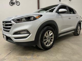 <p>Woah!  Take a look at this 2017 Hyundai Tuscon with only 82k kms on it.  This baby has been gently driven...and it shows with lots of optional equipment to enjoy, including - bluetooth, cruise control, back up camera, heated seats, heated steering wheel, and lots more.  This is one heck of a vehicle - and worth considering, if you are in the market for an affordably priced, accident free, ALL WHEEL DRIVE SUV.  </p><p>All Vehicles are Sold Certified and come with a 3 month/3,000 km 1-Star Powertrain Drive Global Warranty (extended warranties and coverages available). </p><p>At LuckyDog we believe in transparency, thats why all our vehicles come with a complete CarFax Vehicle report to ensure your not buying a salvaged or rebuilt vehicle. </p><p>* While every reasonable effort is made to ensure the accuracy of this information, some vehicle information may not be exactly as shown. </p>