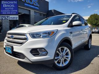 <p>Local, SE, 4WD, 1.5L twin turbo 4 cyl, 6 spd auto, remote entry, heated front seats, backup camera, bluetooth, pwr driver seat, fog lamps, aluminum wheels and more.  </p><p style=border: 0px solid #e3e3e3; box-sizing: border-box; --tw-border-spacing-x: 0; --tw-border-spacing-y: 0; --tw-translate-x: 0; --tw-translate-y: 0; --tw-rotate: 0; --tw-skew-x: 0; --tw-skew-y: 0; --tw-scale-x: 1; --tw-scale-y: 1; --tw-scroll-snap-strictness: proximity; --tw-ring-offset-width: 0px; --tw-ring-offset-color: #fff; --tw-ring-color: rgba(69,89,164,.5); --tw-ring-offset-shadow: 0 0 transparent; --tw-ring-shadow: 0 0 transparent; --tw-shadow: 0 0 transparent; --tw-shadow-colored: 0 0 transparent; margin: 0px 0px 1.25em; color: #0d0d0d; font-family: Söhne, ui-sans-serif, system-ui, -apple-system, Segoe UI, Roboto, Ubuntu, Cantarell, Noto Sans, sans-serif, Helvetica Neue, Arial, Apple Color Emoji, Segoe UI Emoji, Segoe UI Symbol, Noto Color Emoji; font-size: 16px; white-space-collapse: preserve; background-color: #ffffff;><span style=text-decoration: underline;><strong><span style=font-size: 18pt;>The 2018 Ford Escape SE 4WD with a 1.5L turbo 4-cylinder engine and a 6-speed automatic transmission offers several impressive features and benefits:</span></strong></span></p><ol style=border: 0px solid #e3e3e3; box-sizing: border-box; --tw-border-spacing-x: 0; --tw-border-spacing-y: 0; --tw-translate-x: 0; --tw-translate-y: 0; --tw-rotate: 0; --tw-skew-x: 0; --tw-skew-y: 0; --tw-scale-x: 1; --tw-scale-y: 1; --tw-scroll-snap-strictness: proximity; --tw-ring-offset-width: 0px; --tw-ring-offset-color: #fff; --tw-ring-color: rgba(69,89,164,.5); --tw-ring-offset-shadow: 0 0 transparent; --tw-ring-shadow: 0 0 transparent; --tw-shadow: 0 0 transparent; --tw-shadow-colored: 0 0 transparent; list-style-position: initial; list-style-image: initial; margin: 0px; padding: 0px 0px 1rem; color: #0d0d0d; font-family: Söhne, ui-sans-serif, system-ui, -apple-system, Segoe UI, Roboto, Ubuntu, Cantarell, Noto Sans, sans-serif, Helvetica Neue, Arial, Apple Color Emoji, Segoe UI Emoji, Segoe UI Symbol, Noto Color Emoji; font-size: 16px; white-space-collapse: preserve; background-color: #ffffff;><li style=border: 0px solid #e3e3e3; box-sizing: border-box; --tw-border-spacing-x: 0; --tw-border-spacing-y: 0; --tw-translate-x: 0; --tw-translate-y: 0; --tw-rotate: 0; --tw-skew-x: 0; --tw-skew-y: 0; --tw-scale-x: 1; --tw-scale-y: 1; --tw-scroll-snap-strictness: proximity; --tw-ring-offset-width: 0px; --tw-ring-offset-color: #fff; --tw-ring-color: rgba(69,89,164,.5); --tw-ring-offset-shadow: 0 0 transparent; --tw-ring-shadow: 0 0 transparent; --tw-shadow: 0 0 transparent; --tw-shadow-colored: 0 0 transparent; margin-bottom: 0px; margin-top: 0px; padding-left: 0.375em; list-style-position: inside;><p style=border: 0px solid #e3e3e3; box-sizing: border-box; --tw-border-spacing-x: 0; --tw-border-spacing-y: 0; --tw-translate-x: 0; --tw-translate-y: 0; --tw-rotate: 0; --tw-skew-x: 0; --tw-skew-y: 0; --tw-scale-x: 1; --tw-scale-y: 1; --tw-scroll-snap-strictness: proximity; --tw-ring-offset-width: 0px; --tw-ring-offset-color: #fff; --tw-ring-color: rgba(69,89,164,.5); --tw-ring-offset-shadow: 0 0 transparent; --tw-ring-shadow: 0 0 transparent; --tw-shadow: 0 0 transparent; --tw-shadow-colored: 0 0 transparent; margin: 0px; display: inline;><span style=text-decoration: underline;><strong><span style=border: 0px solid #e3e3e3; box-sizing: border-box; --tw-border-spacing-x: 0; --tw-border-spacing-y: 0; --tw-translate-x: 0; --tw-translate-y: 0; --tw-rotate: 0; --tw-skew-x: 0; --tw-skew-y: 0; --tw-scale-x: 1; --tw-scale-y: 1; --tw-scroll-snap-strictness: proximity; --tw-ring-offset-width: 0px; --tw-ring-offset-color: #fff; --tw-ring-color: rgba(69,89,164,.5); --tw-ring-offset-shadow: 0 0 transparent; --tw-ring-shadow: 0 0 transparent; --tw-shadow: 0 0 transparent; --tw-shadow-colored: 0 0 transparent; color: var(--tw-prose-bold); text-decoration: underline;>Efficient Engine</span>:</strong></span> The 1.5L turbocharged 4-cylinder engine strikes a balance between power and fuel efficiency, providing adequate performance while also offering good fuel economy.</p></li><li style=border: 0px solid #e3e3e3; box-sizing: border-box; --tw-border-spacing-x: 0; --tw-border-spacing-y: 0; --tw-translate-x: 0; --tw-translate-y: 0; --tw-rotate: 0; --tw-skew-x: 0; --tw-skew-y: 0; --tw-scale-x: 1; --tw-scale-y: 1; --tw-scroll-snap-strictness: proximity; --tw-ring-offset-width: 0px; --tw-ring-offset-color: #fff; --tw-ring-color: rgba(69,89,164,.5); --tw-ring-offset-shadow: 0 0 transparent; --tw-ring-shadow: 0 0 transparent; --tw-shadow: 0 0 transparent; --tw-shadow-colored: 0 0 transparent; margin-bottom: 0px; margin-top: 0px; padding-left: 0.375em; list-style-position: inside;><p style=border: 0px solid #e3e3e3; box-sizing: border-box; --tw-border-spacing-x: 0; --tw-border-spacing-y: 0; --tw-translate-x: 0; --tw-translate-y: 0; --tw-rotate: 0; --tw-skew-x: 0; --tw-skew-y: 0; --tw-scale-x: 1; --tw-scale-y: 1; --tw-scroll-snap-strictness: proximity; --tw-ring-offset-width: 0px; --tw-ring-offset-color: #fff; --tw-ring-color: rgba(69,89,164,.5); --tw-ring-offset-shadow: 0 0 transparent; --tw-ring-shadow: 0 0 transparent; --tw-shadow: 0 0 transparent; --tw-shadow-colored: 0 0 transparent; margin: 0px; display: inline;><span style=text-decoration: underline;><strong><span style=border: 0px solid #e3e3e3; box-sizing: border-box; --tw-border-spacing-x: 0; --tw-border-spacing-y: 0; --tw-translate-x: 0; --tw-translate-y: 0; --tw-rotate: 0; --tw-skew-x: 0; --tw-skew-y: 0; --tw-scale-x: 1; --tw-scale-y: 1; --tw-scroll-snap-strictness: proximity; --tw-ring-offset-width: 0px; --tw-ring-offset-color: #fff; --tw-ring-color: rgba(69,89,164,.5); --tw-ring-offset-shadow: 0 0 transparent; --tw-ring-shadow: 0 0 transparent; --tw-shadow: 0 0 transparent; --tw-shadow-colored: 0 0 transparent; color: var(--tw-prose-bold); text-decoration: underline;>All-Wheel Drive (AWD) Capability</span>:</strong></span> The 4WD system enhances traction and stability, especially in adverse weather conditions or on rough terrain, ensuring a confident driving experience.</p></li><li style=border: 0px solid #e3e3e3; box-sizing: border-box; --tw-border-spacing-x: 0; --tw-border-spacing-y: 0; --tw-translate-x: 0; --tw-translate-y: 0; --tw-rotate: 0; --tw-skew-x: 0; --tw-skew-y: 0; --tw-scale-x: 1; --tw-scale-y: 1; --tw-scroll-snap-strictness: proximity; --tw-ring-offset-width: 0px; --tw-ring-offset-color: #fff; --tw-ring-color: rgba(69,89,164,.5); --tw-ring-offset-shadow: 0 0 transparent; --tw-ring-shadow: 0 0 transparent; --tw-shadow: 0 0 transparent; --tw-shadow-colored: 0 0 transparent; margin-bottom: 0px; margin-top: 0px; padding-left: 0.375em; list-style-position: inside;><p style=border: 0px solid #e3e3e3; box-sizing: border-box; --tw-border-spacing-x: 0; --tw-border-spacing-y: 0; --tw-translate-x: 0; --tw-translate-y: 0; --tw-rotate: 0; --tw-skew-x: 0; --tw-skew-y: 0; --tw-scale-x: 1; --tw-scale-y: 1; --tw-scroll-snap-strictness: proximity; --tw-ring-offset-width: 0px; --tw-ring-offset-color: #fff; --tw-ring-color: rgba(69,89,164,.5); --tw-ring-offset-shadow: 0 0 transparent; --tw-ring-shadow: 0 0 transparent; --tw-shadow: 0 0 transparent; --tw-shadow-colored: 0 0 transparent; margin: 0px; display: inline;><span style=text-decoration: underline;><strong><span style=border: 0px solid #e3e3e3; box-sizing: border-box; --tw-border-spacing-x: 0; --tw-border-spacing-y: 0; --tw-translate-x: 0; --tw-translate-y: 0; --tw-rotate: 0; --tw-skew-x: 0; --tw-skew-y: 0; --tw-scale-x: 1; --tw-scale-y: 1; --tw-scroll-snap-strictness: proximity; --tw-ring-offset-width: 0px; --tw-ring-offset-color: #fff; --tw-ring-color: rgba(69,89,164,.5); --tw-ring-offset-shadow: 0 0 transparent; --tw-ring-shadow: 0 0 transparent; --tw-shadow: 0 0 transparent; --tw-shadow-colored: 0 0 transparent; color: var(--tw-prose-bold); text-decoration: underline;>Smooth Transmission</span>:</strong></span> The 6-speed automatic transmission delivers smooth shifts, contributing to a comfortable driving experience, whether youre cruising on the highway or navigating through city streets.</p></li><li style=border: 0px solid #e3e3e3; box-sizing: border-box; --tw-border-spacing-x: 0; --tw-border-spacing-y: 0; --tw-translate-x: 0; --tw-translate-y: 0; --tw-rotate: 0; --tw-skew-x: 0; --tw-skew-y: 0; --tw-scale-x: 1; --tw-scale-y: 1; --tw-scroll-snap-strictness: proximity; --tw-ring-offset-width: 0px; --tw-ring-offset-color: #fff; --tw-ring-color: rgba(69,89,164,.5); --tw-ring-offset-shadow: 0 0 transparent; --tw-ring-shadow: 0 0 transparent; --tw-shadow: 0 0 transparent; --tw-shadow-colored: 0 0 transparent; margin-bottom: 0px; margin-top: 0px; padding-left: 0.375em; list-style-position: inside;><p style=border: 0px solid #e3e3e3; box-sizing: border-box; --tw-border-spacing-x: 0; --tw-border-spacing-y: 0; --tw-translate-x: 0; --tw-translate-y: 0; --tw-rotate: 0; --tw-skew-x: 0; --tw-skew-y: 0; --tw-scale-x: 1; --tw-scale-y: 1; --tw-scroll-snap-strictness: proximity; --tw-ring-offset-width: 0px; --tw-ring-offset-color: #fff; --tw-ring-color: rgba(69,89,164,.5); --tw-ring-offset-shadow: 0 0 transparent; --tw-ring-shadow: 0 0 transparent; --tw-shadow: 0 0 transparent; --tw-shadow-colored: 0 0 transparent; margin: 0px; display: inline;><span style=text-decoration: underline;><strong><span style=border: 0px solid #e3e3e3; box-sizing: border-box; --tw-border-spacing-x: 0; --tw-border-spacing-y: 0; --tw-translate-x: 0; --tw-translate-y: 0; --tw-rotate: 0; --tw-skew-x: 0; --tw-skew-y: 0; --tw-scale-x: 1; --tw-scale-y: 1; --tw-scroll-snap-strictness: proximity; --tw-ring-offset-width: 0px; --tw-ring-offset-color: #fff; --tw-ring-color: rgba(69,89,164,.5); --tw-ring-offset-shadow: 0 0 transparent; --tw-ring-shadow: 0 0 transparent; --tw-shadow: 0 0 transparent; --tw-shadow-colored: 0 0 transparent; color: var(--tw-prose-bold); text-decoration: underline;>Spacious Interior</span>:</strong></span> The Escape offers ample space for passengers and cargo, making it suitable for both daily commuting and longer trips. The rear seats can also be folded down to create even more cargo space when needed.</p></li><li style=border: 0px solid #e3e3e3; box-sizing: border-box; --tw-border-spacing-x: 0; --tw-border-spacing-y: 0; --tw-translate-x: 0; --tw-translate-y: 0; --tw-rotate: 0; --tw-skew-x: 0; --tw-skew-y: 0; --tw-scale-x: 1; --tw-scale-y: 1; --tw-scroll-snap-strictness: proximity; --tw-ring-offset-width: 0px; --tw-ring-offset-color: #fff; --tw-ring-color: rgba(69,89,164,.5); --tw-ring-offset-shadow: 0 0 transparent; --tw-ring-shadow: 0 0 transparent; --tw-shadow: 0 0 transparent; --tw-shadow-colored: 0 0 transparent; margin-bottom: 0px; margin-top: 0px; padding-left: 0.375em; list-style-position: inside;><p style=border: 0px solid #e3e3e3; box-sizing: border-box; --tw-border-spacing-x: 0; --tw-border-spacing-y: 0; --tw-translate-x: 0; --tw-translate-y: 0; --tw-rotate: 0; --tw-skew-x: 0; --tw-skew-y: 0; --tw-scale-x: 1; --tw-scale-y: 1; --tw-scroll-snap-strictness: proximity; --tw-ring-offset-width: 0px; --tw-ring-offset-color: #fff; --tw-ring-color: rgba(69,89,164,.5); --tw-ring-offset-shadow: 0 0 transparent; --tw-ring-shadow: 0 0 transparent; --tw-shadow: 0 0 transparent; --tw-shadow-colored: 0 0 transparent; margin: 0px; display: inline;><span style=text-decoration: underline;><strong><span style=border: 0px solid #e3e3e3; box-sizing: border-box; --tw-border-spacing-x: 0; --tw-border-spacing-y: 0; --tw-translate-x: 0; --tw-translate-y: 0; --tw-rotate: 0; --tw-skew-x: 0; --tw-skew-y: 0; --tw-scale-x: 1; --tw-scale-y: 1; --tw-scroll-snap-strictness: proximity; --tw-ring-offset-width: 0px; --tw-ring-offset-color: #fff; --tw-ring-color: rgba(69,89,164,.5); --tw-ring-offset-shadow: 0 0 transparent; --tw-ring-shadow: 0 0 transparent; --tw-shadow: 0 0 transparent; --tw-shadow-colored: 0 0 transparent; color: var(--tw-prose-bold); text-decoration: underline;>Advanced Technology</span>:</strong></span> The 2018 Escape SE comes equipped with modern technology features, including a touchscreen infotainment system, smartphone integration (such as Apple CarPlay and Android Auto).</p></li><li style=border: 0px solid #e3e3e3; box-sizing: border-box; --tw-border-spacing-x: 0; --tw-border-spacing-y: 0; --tw-translate-x: 0; --tw-translate-y: 0; --tw-rotate: 0; --tw-skew-x: 0; --tw-skew-y: 0; --tw-scale-x: 1; --tw-scale-y: 1; --tw-scroll-snap-strictness: proximity; --tw-ring-offset-width: 0px; --tw-ring-offset-color: #fff; --tw-ring-color: rgba(69,89,164,.5); --tw-ring-offset-shadow: 0 0 transparent; --tw-ring-shadow: 0 0 transparent; --tw-shadow: 0 0 transparent; --tw-shadow-colored: 0 0 transparent; margin-bottom: 0px; margin-top: 0px; padding-left: 0.375em; list-style-position: inside;><p style=border: 0px solid #e3e3e3; box-sizing: border-box; --tw-border-spacing-x: 0; --tw-border-spacing-y: 0; --tw-translate-x: 0; --tw-translate-y: 0; --tw-rotate: 0; --tw-skew-x: 0; --tw-skew-y: 0; --tw-scale-x: 1; --tw-scale-y: 1; --tw-scroll-snap-strictness: proximity; --tw-ring-offset-width: 0px; --tw-ring-offset-color: #fff; --tw-ring-color: rgba(69,89,164,.5); --tw-ring-offset-shadow: 0 0 transparent; --tw-ring-shadow: 0 0 transparent; --tw-shadow: 0 0 transparent; --tw-shadow-colored: 0 0 transparent; margin: 0px; display: inline;><span style=text-decoration: underline;><strong><span style=border: 0px solid #e3e3e3; box-sizing: border-box; --tw-border-spacing-x: 0; --tw-border-spacing-y: 0; --tw-translate-x: 0; --tw-translate-y: 0; --tw-rotate: 0; --tw-skew-x: 0; --tw-skew-y: 0; --tw-scale-x: 1; --tw-scale-y: 1; --tw-scroll-snap-strictness: proximity; --tw-ring-offset-width: 0px; --tw-ring-offset-color: #fff; --tw-ring-color: rgba(69,89,164,.5); --tw-ring-offset-shadow: 0 0 transparent; --tw-ring-shadow: 0 0 transparent; --tw-shadow: 0 0 transparent; --tw-shadow-colored: 0 0 transparent; color: var(--tw-prose-bold); text-decoration: underline;>Comfortable Ride</span>:</strong></span> With its well-tuned suspension and comfortable seating, the Escape provides a smooth and enjoyable ride for both driver and passengers, even on longer journeys.</p></li><li style=border: 0px solid #e3e3e3; box-sizing: border-box; --tw-border-spacing-x: 0; --tw-border-spacing-y: 0; --tw-translate-x: 0; --tw-translate-y: 0; --tw-rotate: 0; --tw-skew-x: 0; --tw-skew-y: 0; --tw-scale-x: 1; --tw-scale-y: 1; --tw-scroll-snap-strictness: proximity; --tw-ring-offset-width: 0px; --tw-ring-offset-color: #fff; --tw-ring-color: rgba(69,89,164,.5); --tw-ring-offset-shadow: 0 0 transparent; --tw-ring-shadow: 0 0 transparent; --tw-shadow: 0 0 transparent; --tw-shadow-colored: 0 0 transparent; margin-bottom: 0px; margin-top: 0px; padding-left: 0.375em; list-style-position: inside;><p style=border: 0px solid #e3e3e3; box-sizing: border-box; --tw-border-spacing-x: 0; --tw-border-spacing-y: 0; --tw-translate-x: 0; --tw-translate-y: 0; --tw-rotate: 0; --tw-skew-x: 0; --tw-skew-y: 0; --tw-scale-x: 1; --tw-scale-y: 1; --tw-scroll-snap-strictness: proximity; --tw-ring-offset-width: 0px; --tw-ring-offset-color: #fff; --tw-ring-color: rgba(69,89,164,.5); --tw-ring-offset-shadow: 0 0 transparent; --tw-ring-shadow: 0 0 transparent; --tw-shadow: 0 0 transparent; --tw-shadow-colored: 0 0 transparent; margin: 0px; display: inline;><span style=text-decoration: underline;><strong><span style=border: 0px solid #e3e3e3; box-sizing: border-box; --tw-border-spacing-x: 0; --tw-border-spacing-y: 0; --tw-translate-x: 0; --tw-translate-y: 0; --tw-rotate: 0; --tw-skew-x: 0; --tw-skew-y: 0; --tw-scale-x: 1; --tw-scale-y: 1; --tw-scroll-snap-strictness: proximity; --tw-ring-offset-width: 0px; --tw-ring-offset-color: #fff; --tw-ring-color: rgba(69,89,164,.5); --tw-ring-offset-shadow: 0 0 transparent; --tw-ring-shadow: 0 0 transparent; --tw-shadow: 0 0 transparent; --tw-shadow-colored: 0 0 transparent; color: var(--tw-prose-bold); text-decoration: underline;>Stylish Design</span>:</strong></span>The Escape boasts a sleek and contemporary exterior design, along with a well-appointed interior that exudes quality and sophistication.</p></li><li style=border: 0px solid #e3e3e3; box-sizing: border-box; --tw-border-spacing-x: 0; --tw-border-spacing-y: 0; --tw-translate-x: 0; --tw-translate-y: 0; --tw-rotate: 0; --tw-skew-x: 0; --tw-skew-y: 0; --tw-scale-x: 1; --tw-scale-y: 1; --tw-scroll-snap-strictness: proximity; --tw-ring-offset-width: 0px; --tw-ring-offset-color: #fff; --tw-ring-color: rgba(69,89,164,.5); --tw-ring-offset-shadow: 0 0 transparent; --tw-ring-shadow: 0 0 transparent; --tw-shadow: 0 0 transparent; --tw-shadow-colored: 0 0 transparent; margin-bottom: 0px; margin-top: 0px; padding-left: 0.375em; list-style-position: inside;><p style=border: 0px solid #e3e3e3; box-sizing: border-box; --tw-border-spacing-x: 0; --tw-border-spacing-y: 0; --tw-translate-x: 0; --tw-translate-y: 0; --tw-rotate: 0; --tw-skew-x: 0; --tw-skew-y: 0; --tw-scale-x: 1; --tw-scale-y: 1; --tw-scroll-snap-strictness: proximity; --tw-ring-offset-width: 0px; --tw-ring-offset-color: #fff; --tw-ring-color: rgba(69,89,164,.5); --tw-ring-offset-shadow: 0 0 transparent; --tw-ring-shadow: 0 0 transparent; --tw-shadow: 0 0 transparent; --tw-shadow-colored: 0 0 transparent; margin: 0px; display: inline;><span style=text-decoration: underline;><strong><span style=border: 0px solid #e3e3e3; box-sizing: border-box; --tw-border-spacing-x: 0; --tw-border-spacing-y: 0; --tw-translate-x: 0; --tw-translate-y: 0; --tw-rotate: 0; --tw-skew-x: 0; --tw-skew-y: 0; --tw-scale-x: 1; --tw-scale-y: 1; --tw-scroll-snap-strictness: proximity; --tw-ring-offset-width: 0px; --tw-ring-offset-color: #fff; --tw-ring-color: rgba(69,89,164,.5); --tw-ring-offset-shadow: 0 0 transparent; --tw-ring-shadow: 0 0 transparent; --tw-shadow: 0 0 transparent; --tw-shadow-colored: 0 0 transparent; color: var(--tw-prose-bold); text-decoration: underline;>Good Handling</span>:</strong></span> Despite its SUV body style, the Escape offers responsive handling and precise steering, making it easy to maneuver in various driving situations, from city streets to winding roads.</p></li><li style=border: 0px solid #e3e3e3; box-sizing: border-box; --tw-border-spacing-x: 0; --tw-border-spacing-y: 0; --tw-translate-x: 0; --tw-translate-y: 0; --tw-rotate: 0; --tw-skew-x: 0; --tw-skew-y: 0; --tw-scale-x: 1; --tw-scale-y: 1; --tw-scroll-snap-strictness: proximity; --tw-ring-offset-width: 0px; --tw-ring-offset-color: #fff; --tw-ring-color: rgba(69,89,164,.5); --tw-ring-offset-shadow: 0 0 transparent; --tw-ring-shadow: 0 0 transparent; --tw-shadow: 0 0 transparent; --tw-shadow-colored: 0 0 transparent; margin-bottom: 0px; margin-top: 0px; padding-left: 0.375em; list-style-position: inside;><p style=border: 0px solid #e3e3e3; box-sizing: border-box; --tw-border-spacing-x: 0; --tw-border-spacing-y: 0; --tw-translate-x: 0; --tw-translate-y: 0; --tw-rotate: 0; --tw-skew-x: 0; --tw-skew-y: 0; --tw-scale-x: 1; --tw-scale-y: 1; --tw-scroll-snap-strictness: proximity; --tw-ring-offset-width: 0px; --tw-ring-offset-color: #fff; --tw-ring-color: rgba(69,89,164,.5); --tw-ring-offset-shadow: 0 0 transparent; --tw-ring-shadow: 0 0 transparent; --tw-shadow: 0 0 transparent; --tw-shadow-colored: 0 0 transparent; margin: 0px; display: inline;><span style=text-decoration: underline;><strong><span style=border: 0px solid #e3e3e3; box-sizing: border-box; --tw-border-spacing-x: 0; --tw-border-spacing-y: 0; --tw-translate-x: 0; --tw-translate-y: 0; --tw-rotate: 0; --tw-skew-x: 0; --tw-skew-y: 0; --tw-scale-x: 1; --tw-scale-y: 1; --tw-scroll-snap-strictness: proximity; --tw-ring-offset-width: 0px; --tw-ring-offset-color: #fff; --tw-ring-color: rgba(69,89,164,.5); --tw-ring-offset-shadow: 0 0 transparent; --tw-ring-shadow: 0 0 transparent; --tw-shadow: 0 0 transparent; --tw-shadow-colored: 0 0 transparent; color: var(--tw-prose-bold); text-decoration: underline;>Reliability</span>:</strong></span> Ford has a reputation for building reliable vehicles, and the Escape is no exception. With proper maintenance, the 2018 Escape SE can provide years of trouble-free driving.</p></li><li style=border: 0px solid #e3e3e3; box-sizing: border-box; --tw-border-spacing-x: 0; --tw-border-spacing-y: 0; --tw-translate-x: 0; --tw-translate-y: 0; --tw-rotate: 0; --tw-skew-x: 0; --tw-skew-y: 0; --tw-scale-x: 1; --tw-scale-y: 1; --tw-scroll-snap-strictness: proximity; --tw-ring-offset-width: 0px; --tw-ring-offset-color: #fff; --tw-ring-color: rgba(69,89,164,.5); --tw-ring-offset-shadow: 0 0 transparent; --tw-ring-shadow: 0 0 transparent; --tw-shadow: 0 0 transparent; --tw-shadow-colored: 0 0 transparent; margin-bottom: 0px; margin-top: 0px; padding-left: 0.375em; list-style-position: inside;><p style=border: 0px solid #e3e3e3; box-sizing: border-box; --tw-border-spacing-x: 0; --tw-border-spacing-y: 0; --tw-translate-x: 0; --tw-translate-y: 0; --tw-rotate: 0; --tw-skew-x: 0; --tw-skew-y: 0; --tw-scale-x: 1; --tw-scale-y: 1; --tw-scroll-snap-strictness: proximity; --tw-ring-offset-width: 0px; --tw-ring-offset-color: #fff; --tw-ring-color: rgba(69,89,164,.5); --tw-ring-offset-shadow: 0 0 transparent; --tw-ring-shadow: 0 0 transparent; --tw-shadow: 0 0 transparent; --tw-shadow-colored: 0 0 transparent; margin: 0px; display: inline;> </p><span style=text-decoration: underline;><strong>Overall, the 2018 Ford Escape SE 4WD with a 1.5L turbo 4-cylinder engine and 6-speed automatic transmission offers a compelling combination of performance, efficiency, versatility, and modern features, making it a popular choice in the compact SUV segment.</strong></span></li></ol><p>Please drop by Brown Bros Auto Clearance for a look and a test drive.  Youll be glad you did.  </p><p>Brown Bros Auto Clearance Centre, home of the 30 day exchange policy. We finance when others cant. Easy pricing, easy payments, easy financing. Low finance rates. Cash back or deferred payments available. Visit our website: www.brownbrosautoclearancecentre.com to see our complete inventory of used cars and trucks in Surrey.</p>