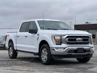 White 2022 Ford F-150 XLT 302A 302A 4D SuperCrew 3.5L V6 EcoBoost 10-Speed Automatic 4WD 4WD, 10-Way Power Driver & Passenger Seats, 2-Bar Style Chrome Surround Grille w/Black Accents, 3.31 Axle Ratio, 6 Bright Polished Running Board, 8 Productivity Screen in Instrument Cluster, Air Conditioning, Alloy wheels, AM/FM radio: SiriusXM with 360L, Auto High-beam Headlights, BLIS w/Trailer Tow Coverage, Block heater, BoxLink Cargo Management System, Chrome Door & Tailgate Handles w/Body-Colour Bezel, Chrome Single-Tip Exhaust, Class IV Trailer Hitch Receiver, Compass, Cruise Control, Delay-off headlights, Driver door bin, Driver vanity mirror, Dual Zone Electronic Automatic Temperature Control, Equipment Group 302A High, Front fog lights, Fully automatic headlights, Illuminated entry, Integrated Trailer Brake Controller, Intelligent Access w/Push Button Start, Interior Auto-Dimming Rearview Mirror, Leather-Wrapped Steering Wheel, LED Box Lighting w/Zone Lighting, LED Reflector Headlamps, LED Side-Mirror Spotlights, Manual Folding Power Glass Sideview Heated Mirrors, Onboard 400W Outlet, Passenger door bin, Passenger vanity mirror, Power steering, Power windows, Power-Sliding Rear Window w/Privacy Glass, Pro Trailer Backup Assist, Rear Under-Seat Storage, Rear window defroster, Remote keyless entry, Remote Start System w/Remote Tailgate Release, SecuriCode Drivers Side Keyless-Entry Keypad, SYNC 4 w/Enhanced Voice Recognition, Tachometer, Telescoping steering wheel, Tilt steering wheel, Trailer Tow Package, Variably intermittent wipers, Wheels: 18 Chrome-Like PVD, XTR 4x4 Decal, XTR Package.