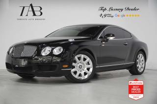 This Powerful 2006 Bentley Continental GT W12 Twin Turbocharged is a luxury grand tourer known for its powerful performance, exquisite craftsmanship, and opulent features. It offers smooth power delivery and impressive performance characteristics, making it well-suited for both spirited driving and long-distance cruising.

Key Features Includes:

- W12
- Twin Turbocharged
- Navigation
- FM/AM
- Front Heated Seats
- Front Massaging Seats
- Cruise control
- Electronic Stability control
- Traction control
- 19" Alloy Wheels

NOW OFFERING 3 MONTH DEFERRED FINANCING PAYMENTS ON APPROVED CREDIT. 

Looking for a top-rated pre-owned luxury car dealership in the GTA? Look no further than Toronto Auto Brokers (TAB)! Were proud to have won multiple awards, including the 2023 GTA Top Choice Luxury Pre Owned Dealership Award, 2023 CarGurus Top Rated Dealer, 2024 CBRB Dealer Award, the Canadian Choice Award 2024,the 2024 BNS Award, the 2023 Three Best Rated Dealer Award, and many more!

With 30 years of experience serving the Greater Toronto Area, TAB is a respected and trusted name in the pre-owned luxury car industry. Our 30,000 sq.Ft indoor showroom is home to a wide range of luxury vehicles from top brands like BMW, Mercedes-Benz, Audi, Porsche, Land Rover, Jaguar, Aston Martin, Bentley, Maserati, and more. And we dont just serve the GTA, were proud to offer our services to all cities in Canada, including Vancouver, Montreal, Calgary, Edmonton, Winnipeg, Saskatchewan, Halifax, and more.

At TAB, were committed to providing a no-pressure environment and honest work ethics. As a family-owned and operated business, we treat every customer like family and ensure that every interaction is a positive one. Come experience the TAB Lifestyle at its truest form, luxury car buying has never been more enjoyable and exciting!

We offer a variety of services to make your purchase experience as easy and stress-free as possible. From competitive and simple financing and leasing options to extended warranties, aftermarket services, and full history reports on every vehicle, we have everything you need to make an informed decision. We welcome every trade, even if youre just looking to sell your car without buying, and when it comes to financing or leasing, we offer same day approvals, with access to over 50 lenders, including all of the banks in Canada. Feel free to check out your own Equifax credit score without affecting your credit score, simply click on the Equifax tab above and see if you qualify.

So if youre looking for a luxury pre-owned car dealership in Toronto, look no further than TAB! We proudly serve the GTA, including Toronto, Etobicoke, Woodbridge, North York, York Region, Vaughan, Thornhill, Richmond Hill, Mississauga, Scarborough, Markham, Oshawa, Peteborough, Hamilton, Newmarket, Orangeville, Aurora, Brantford, Barrie, Kitchener, Niagara Falls, Oakville, Cambridge, Kitchener, Waterloo, Guelph, London, Windsor, Orillia, Pickering, Ajax, Whitby, Durham, Cobourg, Belleville, Kingston, Ottawa, Montreal, Vancouver, Winnipeg, Calgary, Edmonton, Regina, Halifax, and more.

Call us today or visit our website to learn more about our inventory and services. And remember, all prices exclude applicable taxes and licensing, and vehicles can be certified at an additional cost of $799.