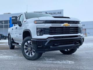 <br> <br> With stout build quality and astounding towing capability, there isnt a better choice than this Silverado 2500HD for all your work-site needs. <br> <br>This 2024 Silverado 2500HD is highly configurable work truck that can haul a colossal amount of weight thanks to its potent drivetrain. This truck also offers amazing interior features that nestle occupants in comfort and luxury, with a great selection of tech features. For heavy-duty activities and even long-haul trips, the Silverado 2500HD is all the truck youll ever need.<br> <br> This summit white sought after diesel Crew Cab 4X4 pickup has an automatic transmission and is powered by a 470HP 6.6L 8 Cylinder Engine.<br> <br> Our Silverado 2500HDs trim level is Custom. Stepping up to this Silverado 2500HD Custom is a great choice as it comes with features like stylish aluminum wheels, a 7 inch touchscreen with Bluetooth streaming audio, Apple CarPlay and Android Auto, a heavy-duty locking rear differential, painted bumpers and remote keyless entry. Additional features also include cruise control and steering wheel audio controls, 4G LTE hotspot capability, a rear vision camera, teen driver technology, easy to clean rubberized floors, power windows and much more. This vehicle has been upgraded with the following features: Multi-pro Tailgate, Apple Carplay, Android Auto. <br><br> <br/><br>Contact our Sales Department today by: <br><br>Phone: 1 (306) 882-2691 <br><br>Text: 1-306-800-5376 <br><br>- Want to trade your vehicle? Make the drive and well have it professionally appraised, for FREE! <br><br>- Financing available! Onsite credit specialists on hand to serve you! <br><br>- Apply online for financing! <br><br>- Professional, courteous, and friendly staff are ready to help you get into your dream ride! <br><br>- Call today to book your test drive! <br><br>- HUGE selection of new GMC, Buick and Chevy Vehicles! <br><br>- Fully equipped service shop with GM certified technicians <br><br>- Full Service Quick Lube Bay! Drive up. Drive in. Drive out! <br><br>- Best Oil Change in Saskatchewan! <br><br>- Oil changes for all makes and models including GMC, Buick, Chevrolet, Ford, Dodge, Ram, Kia, Toyota, Hyundai, Honda, Chrysler, Jeep, Audi, BMW, and more! <br><br>- Rosetowns ONLY Quick Lube Oil Change! <br><br>- 24/7 Touchless car wash <br><br>- Fully stocked parts department featuring a large line of in-stock winter tires! <br> <br><br><br>Rosetown Mainline Motor Products, also known as Mainline Motors is the ORIGINAL King Of Trucks, featuring Chevy Silverado, GMC Sierra, Buick Enclave, Chevy Traverse, Chevy Equinox, Chevy Cruze, GMC Acadia, GMC Terrain, and pre-owned Chevy, GMC, Buick, Ford, Dodge, Ram, and more, proudly serving Saskatchewan. As part of the Mainline Automotive Group of Dealerships in Western Canada, we are also committed to servicing customers anywhere in Western Canada! We have a huge selection of cars, trucks, and crossover SUVs, so if youre looking for your next new GMC, Buick, Chevrolet or any brand on a used vehicle, dont hesitate to contact us online, give us a call at 1 (306) 882-2691 or swing by our dealership at 506 Hyw 7 W in Rosetown, Saskatchewan. We look forward to getting you rolling in your next new or used vehicle! <br> <br><br><br>* Vehicles may not be exactly as shown. Contact dealer for specific model photos. Pricing and availability subject to change. All pricing is cash price including fees. Taxes to be paid by the purchaser. While great effort is made to ensure the accuracy of the information on this site, errors do occur so please verify information with a customer service rep. This is easily done by calling us at 1 (306) 882-2691 or by visiting us at the dealership. <br><br> Come by and check out our fleet of 50+ used cars and trucks and 130+ new cars and trucks for sale in Rosetown. o~o