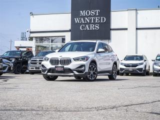 <div style=text-align: justify;><span style=font-size:14px;><span style=font-family:times new roman,times,serif;>This 2021 BMW X1 has a CLEAN CARFAX with no accidents and is also a one owner Canadian (Ontario) lease return vehicle. High-value options included with this vehicle are; lane depature warning, pre-collision warning, navigation, black leather / heated / power / memory seats, dual sunroof, panoramic sunroof, heated steering wheel, convenience entry, app connect, panoroof, xenon headlights, back up camera, touchscreen, multifunction steering wheel, 18” alloy rims and fog lights, offering immense value.<br /> <br /><strong>A used set of tires is also available for purchase, please ask your sales representative for pricing.</strong><br /> <br />Why buy from us?<br /> <br />Most Wanted Cars is a place where customers send their family and friends. MWC offers the best financing options in Kitchener-Waterloo and the surrounding areas. Family-owned and operated, MWC has served customers since 1975 and is also DealerRater’s 2022 Provincial Winner for Used Car Dealers. MWC is also honoured to have an A+ standing on Better Business Bureau and a 4.8/5 customer satisfaction rating across all online platforms with over 1400 reviews. With two locations to serve you better, our inventory consists of over 150 used cars, trucks, vans, and SUVs.<br /> <br />Our main office is located at 1620 King Street East, Kitchener, Ontario. Please call us at 519-772-3040 or visit our website at www.mostwantedcars.ca to check out our full inventory list and complete an easy online finance application to get exclusive online preferred rates.<br /> <br />*Price listed is available to finance purchases only on approved credit. The price of the vehicle may differ from other forms of payment. Taxes and licensing are excluded from the price shown above*</span></span></div>