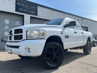 Introducing the 2006 Dodge Ram 2500, a custom-built powerhouse boasting a staggering 700 horsepower and 1200 ft/lbs of torque. With approximately $35,000 invested in upgrades, this Ram 2500, equipped with a Cummins diesel engine, is a force to be reckoned with on any terrain. From its lifted stance to its rugged exterior, every aspect of this truck exudes power and dominance. Step inside to experience its luxurious amenities amidst its raw performance. Dont miss out on owning this extraordinary Ram 2500visit our dealership today.