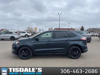 <b>Sunroof, Heated Seats, Ford Co-Pilot360 Assist+, Equipment 250A Group, Cold Weather Package!</b><br> <br> <br> <br>Check out the large selection of new Fords at Tisdales today!<br> <br>  With a great mix of efficiency and incredible performance, the Ford Edge is here to get you wherever you want to go. <br> <br>With meticulous attention to detail and amazing style, the Ford Edge seamlessly integrates power, performance and handling with awesome technology to help you multitask your way through the challenges that life throws your way. Made for an active lifestyle and spontaneous getaways, the Ford Edge is as rough and tumble as you are. Push the boundaries and stay connected to the road with this sweet ride!<br> <br> This stone blue metallic SUV  has an automatic transmission and is powered by a  250HP 2.0L 4 Cylinder Engine.<br> <br> Our Edges trim level is ST Line. Taking things to the edge with this ST Line trim, featuring unique gloss-black wheels, a blacked-out grille with trim-specific exterior styling, aggressive exhaust tips, front fog lamps, a numeric keypad for extra security, and supportive ActiveX heated front bucket seats, with power-adjustment and lumbar support. This trim also features a power liftgate for rear cargo access, a key fob with remote engine start and rear parking sensors, a 12-inch capacitive infotainment screen bundled with wireless Apple CarPlay and Android Auto, SiriusXM satellite radio, a 6-speaker audio setup, and 4G mobile hotspot internet connectivity. You and yours are assured of optimum road safety, with blind spot detection, rear cross traffic alert, pre-collision assist with automatic emergency braking, lane keeping assist, lane departure warning, forward collision alert, driver monitoring alert, and a rearview camera with an inbuilt washer. Also standard include proximity keyless entry, dual-zone climate control, 60-40 split front folding rear seats, LED headlights with automatic high beams, and even more. This vehicle has been upgraded with the following features: Sunroof, Heated Seats, Ford Co-pilot360 Assist+, Equipment 250a Group, Cold Weather Package, Trailer Tow Package. <br><br> View the original window sticker for this vehicle with this url <b><a href=http://www.windowsticker.forddirect.com/windowsticker.pdf?vin=2FMPK4J92RBA73360 target=_blank>http://www.windowsticker.forddirect.com/windowsticker.pdf?vin=2FMPK4J92RBA73360</a></b>.<br> <br>To apply right now for financing use this link : <a href=http://www.tisdales.com/shopping-tools/apply-for-credit.html target=_blank>http://www.tisdales.com/shopping-tools/apply-for-credit.html</a><br><br> <br/> Total  cash rebate of $4500 is reflected in the price. Credit includes $4,500 Non-Stackable Cash Purchase Assistance. Credit is available in lieu of subvented financing rates.  Incentives expire 2024-04-30.  See dealer for details. <br> <br>Tisdales is not your standard dealership. Sales consultants are available to discuss what vehicle would best suit the customer and their lifestyle, and if a certain vehicle isnt readily available on the lot, one will be brought in. o~o