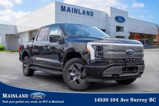 <p><strong><span style=font-family:Arial; font-size:18px;>Roam the roads in unrivaled style and sophistication, where power meets precision in every curve and corner in this 2023 Ford F-150 Lightning..</span></strong></p> <p><strong><span style=font-family:Arial; font-size:18px;>This brand new Lariat trim pickup is a thunderbolt of power and innovation wrapped in a glossy Black exterior..</span></strong> <br> With the robustness of a tough-as-nails truck and the sleekness of a modern marvel, this F-150 Lightning is redefining the future of driving.. Under the hood, youll find a state-of-the-art electric engine mirrored with a 1-Speed Automatic Transmission, delivering an electrifying drive thats smoother than a jazz performance.</p> <p><strong><span style=font-family:Arial; font-size:18px;>Its groundbreaking design paired with exceptional features like adjustable pedals, traction control, and a navigation system ensures a driving experience thats as comfortable as its thrilling..</span></strong> <br> The F-150 Lightning doesnt just shine; it glows.. Its auto-dimming door mirrors and high-beam headlights adjust automatically to keep everything illuminated just right.</p> <p><strong><span style=font-family:Arial; font-size:18px;>Luxurious leather upholstery, dual-zone A/C, and heated door mirrors make every journey a first-class experience..</span></strong> <br> And with the additional perk of a supercrew cab, you can share this experience with your entire crew.. Safety is a priority with this spectacular vehicle.</p> <p><strong><span style=font-family:Arial; font-size:18px;>ABS Brakes, airbags at every possible angle, and an advanced security system ensure your peace of mind..</span></strong> <br> On top of that, features like the Exterior parking cameras and Traffic sign information keep you in control and aware of your surroundings at all times.. With the F-150 Lightnings impressive set of features, every drive will feel like a personal concert - one where youre the star.</p> <p><strong><span style=font-family:Arial; font-size:18px;>The steering wheel mounted audio controls let you orchestrate your soundtrack while keeping your focus on the road..</span></strong> <br> At Mainland Ford, we understand that buying a vehicle is more than a transaction - its a journey.. Thats why were committed to making this journey as smooth as possible, no matter what language you speak.</p> <p><strong><span style=font-family:Arial; font-size:18px;>Choose the 2023 Ford F-150 Lightning to add a spark to your driving experience..</span></strong> <br> Its more than a vehicle; its a statement; A beacon of innovation and design that will put you miles ahead of the crowd.. Dont just keep up with the times, drive the future.</p> <p><strong><span style=font-family:Arial; font-size:18px;>At Mainland Ford, the future has never looked this electrifying!.</span></strong></p><hr />
<p><br />
To apply right now for financing use this link : <a href=https://www.mainlandford.com/credit-application/ target=_blank>https://www.mainlandford.com/credit-application/</a><br />
<br />
Book your test drive today! Mainland Ford prides itself on offering the best customer service. We also service all makes and models in our World Class service center. Come down to Mainland Ford, proud member of the Trotman Auto Group, located at 14530 104 Ave in Surrey for a test drive, and discover the difference!<br />
<br />
***All vehicle sales are subject to a $599 Documentation Fee, $149 Fuel Surcharge, $599 Safety and Convenience Fee, $500 Finance Placement Fee plus applicable taxes***<br />
<br />
VSA Dealer# 40139</p>

<p>*All prices are net of all manufacturer incentives and/or rebates and are subject to change by the manufacturer without notice. All prices plus applicable taxes, applicable environmental recovery charges, documentation of $599 and full tank of fuel surcharge of $76 if a full tank is chosen.<br />Other items available that are not included in the above price:<br />Tire & Rim Protection and Key fob insurance starting from $599<br />Service contracts (extended warranties) for up to 7 years and 200,000 kms<br />Custom vehicle accessory packages, mudflaps and deflectors, tire and rim packages, lift kits, exhaust kits and tonneau covers, canopies and much more that can be added to your payment at time of purchase<br />Undercoating, rust modules, and full protection packages<br />Flexible life, disability and critical illness insurances to protect portions of or the entire length of vehicle loan?im?im<br />Financing Fee of $500 when applicable<br />Prices shown are determined using the largest available rebates and incentives and may not qualify for special APR finance offers. See dealer for details. This is a limited time offer.</p>