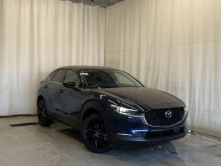 <p>NEW 2024 CX-30 GT Turbo AWD. Bluetooth, Skyactiv-G 2.5 T (Inline-4) Dynamic Pressure Turbo (DPT), 360° Cam, Available NAV, Wireless Phone Charger, Type C USB Ports, Wireless Apple CarPlay & Android Auto, Memory Driver Seat, Leather Heated Seats, Bose Premium Sound System, Garage Door Opener, Parking Sensors, Advanced Keyless Remote Entry, Power Trunk, Adaptive Cruise Control, Heated Steering Wheel, Auto Rain-Sensing Wipers, Electronic Parking Brake, Heated Mirrors, Auto-Dual Zone Climate Control, Rear Air Vents, 18 Black Finish Alloy Wheels</p>  <p>Includes:</p> <p>Skyactiv-G 2.5 Turbo Engine (Inline-4) Dynamic Pressure Turbo (DPT)</p>  <p>i-ACTIVSENSE + Safety Features (Smart City Brake Support-Front, Day/Night Forward Pedestrian Detection, Driver Attention Alert, Rear Cross Traffic Alert, Mazda Radar Cruise Control With Stop & Go, Distance Recognition Support System, Lane-Keep Assist System, Lane Departure Warning System, Advanced Blind Spot Monitoring)</p>  <p>Our dynamic 2024 Mazda CX-30 GT Turbo AWD can deliver terrific thrills in Deep Crystal Blue Mica! Powered by a TurboCharged 2.5 Liter 4 Cylinder that delivers 250hp to a paddle-shifted 6 Speed Automatic transmission for aggressive acceleration. This All Wheel Drive SUV is also eager to explore, thanks to Off-road Traction Assist, and it sees nearly approximately 7.1L/100km on the highway. Sweeping lines emphasize the sporty nature of our spirited CX-30, which has signature LED lighting, a power sunroof, a power liftgate, a gloss-black grille, and bold alloy wheels.</p>  <p>A simple yet refined look awaits in our GT Turbo cabin with heated leather front sport seats, eight-way power for the driver, a leather heated steering wheel, dual-zone automatic climate control, and keyless access/ignition. You can also enjoy easy access to connections, directions, and tunes with a central display, available full-color navigation, a Commander controller, Android Auto, Apple CarPlay, Bluetooth, voice recognition, and a Bose audio system with gloss-painted speaker grilles.</p>  <p>Mazda helps seal the deal with smart safety from adaptive cruise control, automatic braking, rear cross-traffic alert, a rearview camera, lane-departure warning, a blind-spot monitor, a driver attention monitor, and more. A leading choice for style and drivability, our CX-30 GT Turbo awaits! Save this page, Come in for a Qualified Test Drive! We Know You Will Enjoy Your Test Drive Towards Ownership!</p>  <p>Call 587-409-5859 for more info or to schedule an appointment! Listed Pricing is valid for 72 hours. Financing is available, please see dealer for term availability and interest rates. AMVIC Licensed Business.</p>