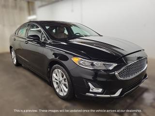 <p>The <strong>2019 Ford Fusion Energi</strong> stands out as a cutting-edge plug-in electric sedan, marrying modern design with eco-friendly technology. With its sleek exterior lines and aerodynamic profile, the Fusion Energi exudes sophistication on the road while silently contributing to a cleaner environment.</p><p> </p><p>At the heart of its innovation lies a hybrid-electric drivetrain, distinguished by its ability to be charged via a standard electrical outlet. This feature allows drivers to enjoy extended electric-only driving range, significantly reducing reliance on traditional gasoline power and emissions.</p><p> </p><p>Inside, the Fusion Energi offers a comfortable and spacious cabin with premium materials and intuitive technology features. The driver-centric cockpit ensures convenience and accessibility, while the available SYNC® 3 infotainment system keeps occupants connected and entertained.</p><p> </p><p>Safety remains paramount in the Fusion Energi, boasting a suite of advanced driver-assist technologies such as lane-keeping assist, adaptive cruise control, and automatic emergency braking.</p><p> </p><p>In summary, the 2019 Ford Fusion Energi is not just a stylish sedan but also a forward-thinking plug-in electric vehicle, offering a harmonious blend of efficiency, comfort, and advanced technology to conscientious drivers seeking a greener driving experience.</p>