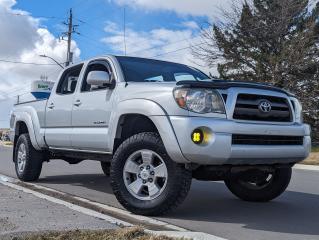 <p>Super clean 2009 Tacoma TRD Sport Double Cab 4x4 6foot box with only 185,000km! Bulletproof Toyota reliability & clean frame. This is a excellent example of a well maintained 2nd gen Tacoma. </p><p> </p><p>Ontario truck since new. Only 2 owners. No accident history. Carfax available. Clean title. Was owned by a retired gentleman who used it for daily driving and occasionally towing a light camper trailer and 16foot fishing boat during the summer. Just traded in on a new Jeep.</p><p> </p><p>In great condition condition inside and out. Well cared for its entire life and it shows! No rust issues. Frame was inspected by the Toyota dealer and factory undercoating applied. Has been regularly oil sprayed as well. </p><p> </p><p>This Tacoma has had tons of recent maintenance done by the previous owner within the last year or so. New lower control arms, new upper control arms, new calibers, pads and rotors. Brake fluid flush. Trans fluid, diff fluid. Serpentine belt, bearings, spark plugs. </p><p>Maxis Razor AT tires have about 20k on them. </p><p> </p><p>Just safety inspected & certified. We did both exhaust manifolds (driver & passenger). Only the drivers side really needed replacing but while we were in there better as well replace both. 02 sensors. Fresh alignment & oil change done. </p><p> </p><p>All features work. AC blows cold. 4high/low work. Can only fault the truck for a small rip in the drivers seat but overall its in great shape. </p><p> </p><p>A few tasteful upgrades have been done to the truck. Eibach Pro Lift stage 2 lift, Icon leafs in the rear. Hard tri fold tonneau cover, headunit & updated foglights. </p><p> </p><p>Youre going to be hard pressed to find a lower mileage, nicer 2nd Tacoma under $20,000. Its priced reasonably and for a quick sale. We love selling Toyota trucks here and this will make a great truck for the new owner. Needs nothing to enjoy. If you have any questions please just ask. </p><p> </p><p>Price is + TAX + licensing fees.</p><p>Financing and trade-ins available.</p><p>Test drives by appointment only. </p><p>OMVIC registered dealership & UCDA Member</p><p>Starks Motorsports LTD</p><p>Address: 48 Woodsle</p><p>e Ave unit 3 Paris ON</p>