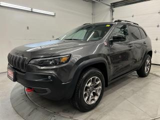 LOADED 4x4 TRAILHAWK W/ 3.2L V6! Heated leather seats & steering, remote start, blind spot monitor, rear cross-traffic alert, backup camera w/ rear park sensors, 8.4-inch touchscreen w/ Apple CarPlay/Android Auto, 17-inch alloys, power seat, dual-zone climate control, power liftgate, rain-sensing wipers, rear differential lock, ambient lighting, automatic headlights, auto-dimming rearview mirror, keyless entry w/ push start, skid plates, garage door opener, Bluetooth and Sirius XM!