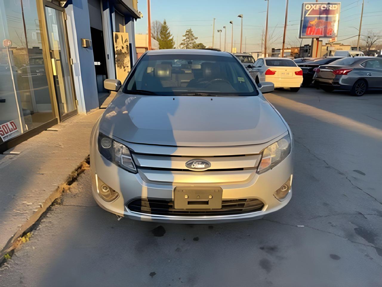 Used 2012 Ford Fusion SEL AWD CERTIFIED LEATHER ROOF WE FINANCE ALL CRED for sale in London, ON