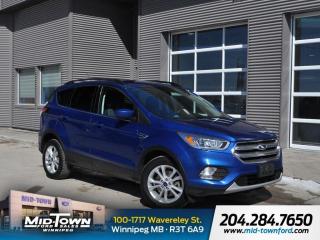 New Price!<BR><BR>4WD.<BR><BR>Odometer is 27413 kilometers below market average! Lightning Blue Metallic 2017 Ford Escape SE 4WD 1.5L EcoBoost 6-Speed Automatic<BR><BR><BR>For further information please contact MidTown Ford sales department directly at 204-284-7650. Dealer #9695.<BR><BR><BR>Reviews:<BR> * Owners appreciate a modern and unique cabin layout, peace of mind in bad weather, and pleasing performance from the turbocharged engines, particularly the larger 2.0L unit. Controls are said to be easy to use, and interfaces are easily learned. Plenty of at-hand storage is fitted within reach of all occupants to help keep organized and tidy on the move, and the tall and upright driving position helps add confidence. Good brake feel is also noted, particularly during hard stops. Source: autoTRADER.ca