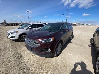 <p>2019 Edge Titanium AWD, 77,226 kms! This is a very loaded Edge, panoramic roof, heated steering wheel, heated and cooled front seats, heated windshield wiper de-icer, heated rear seats, 2.0L Ecoboost engine, auto dim driver mirror, class II trailer tow package, wireless charging pad and more.  Call us or come down for a test drive!</p>